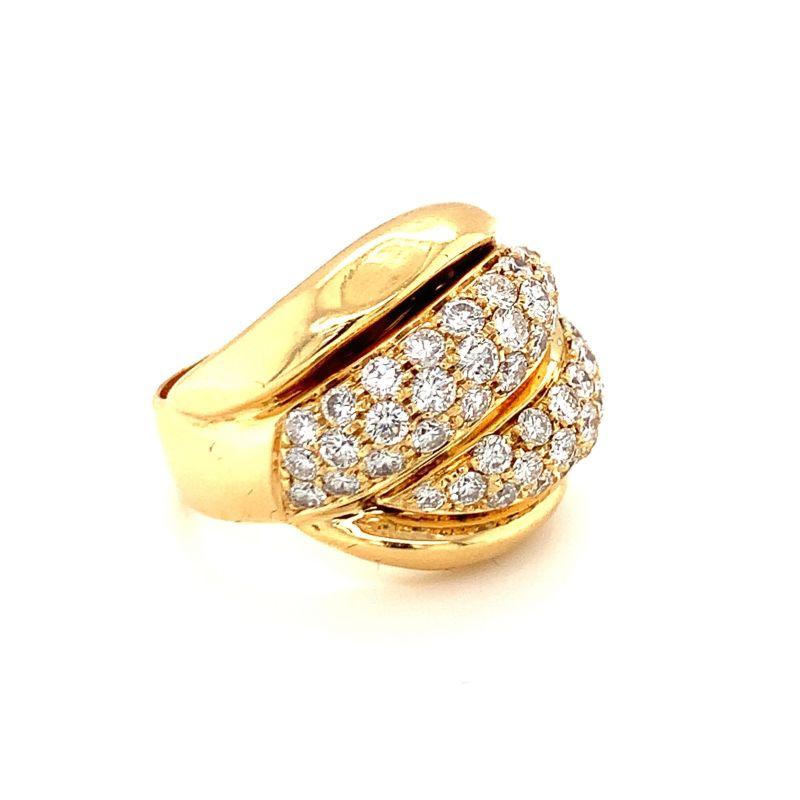 One pave diamond bombe 18K yellow gold ring featuring two portions of pave set, round brilliant cut diamonds totaling 3 ct. Italian hallmarks, circa 1970s.

Gleaming, mighty, quality.

Additional information:
Metal: 18K yellow gold
Gemstone:
