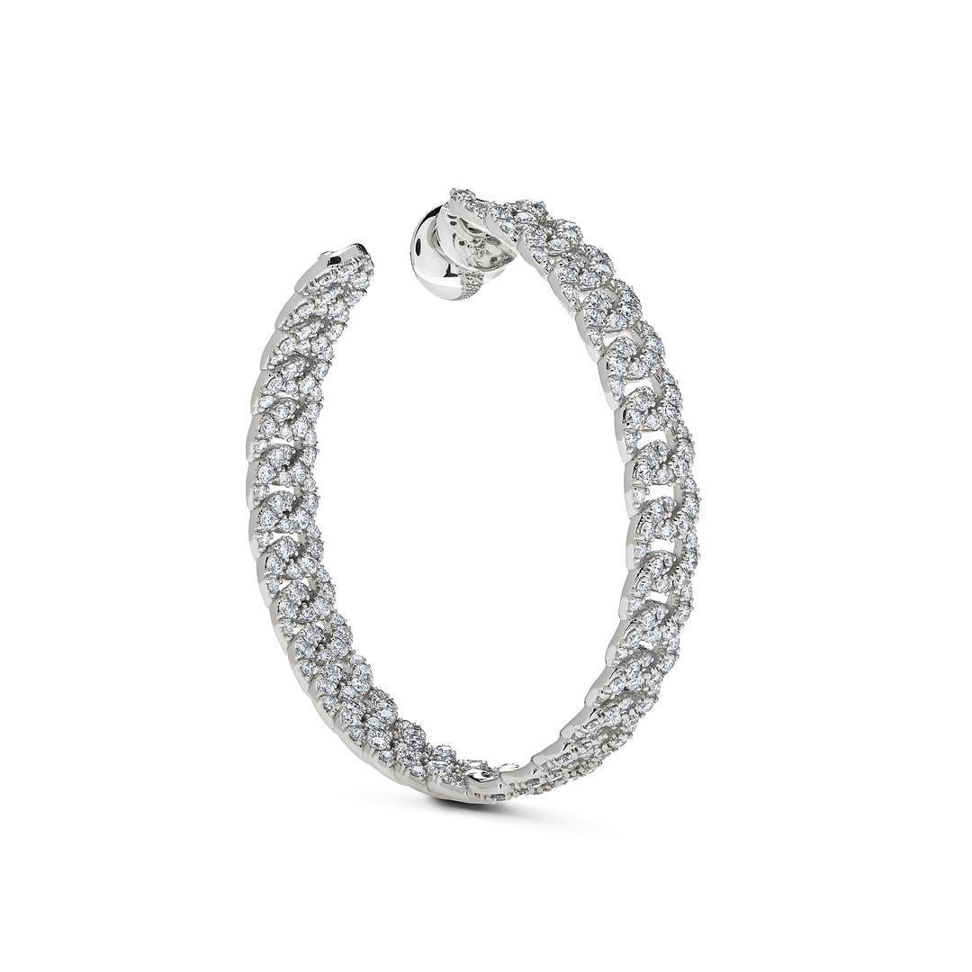 Elevate your ensemble with these Large Pave Diamond Chain Link Hoop Earrings. Crafted from lustrous 18-karat white gold, these earrings exude timeless elegance and sophistication.

Adorned with a total of 5.69 carats of diamonds, these hoop earrings