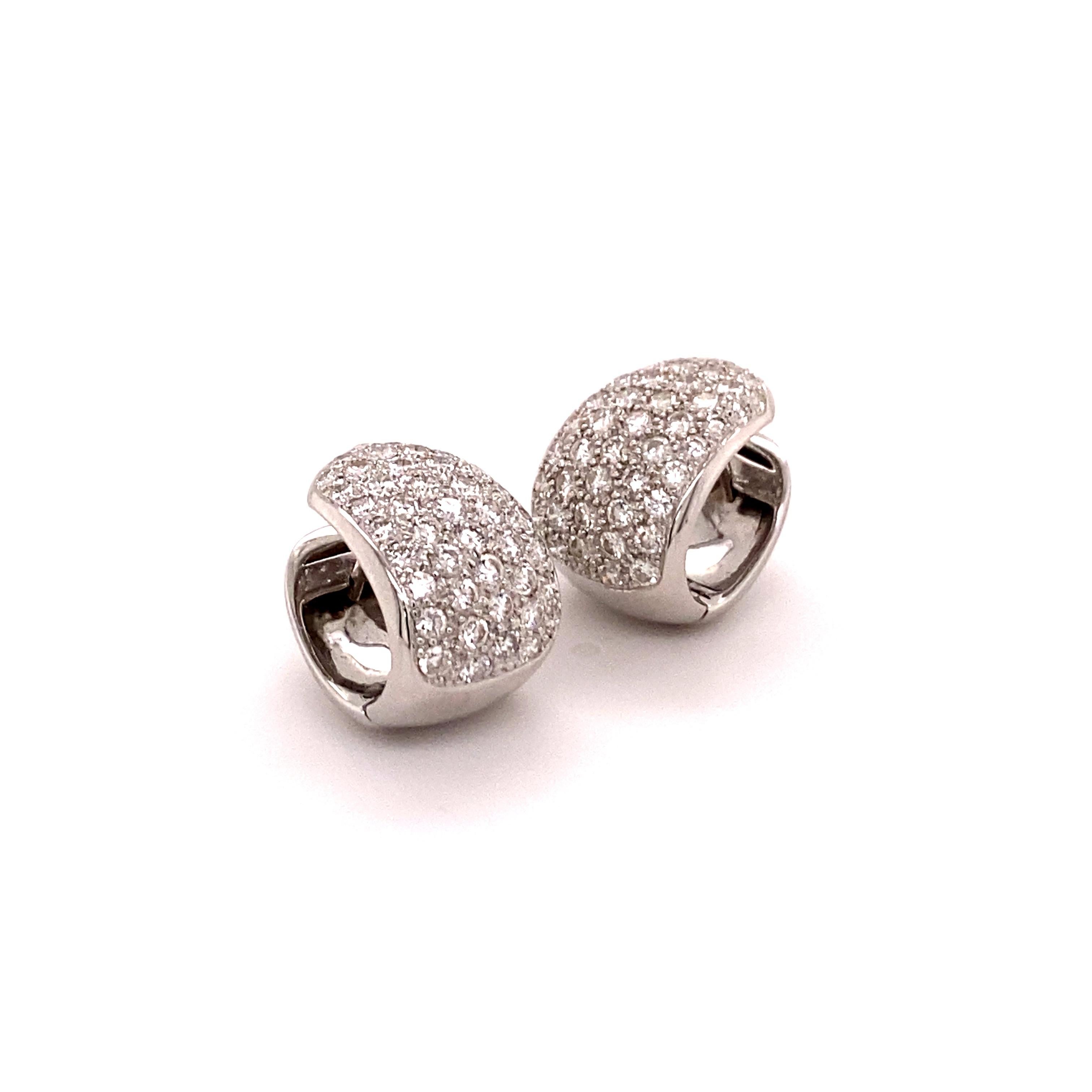 Elegant and classic diamond clip-on earrings crafted in 18K white gold. Two pavé set beds with a total of 86 brilliant-cut diamonds together weighing 1.72 carats . The diamonds are of G/H colour and si clarity.

A must have in every modern jewellery