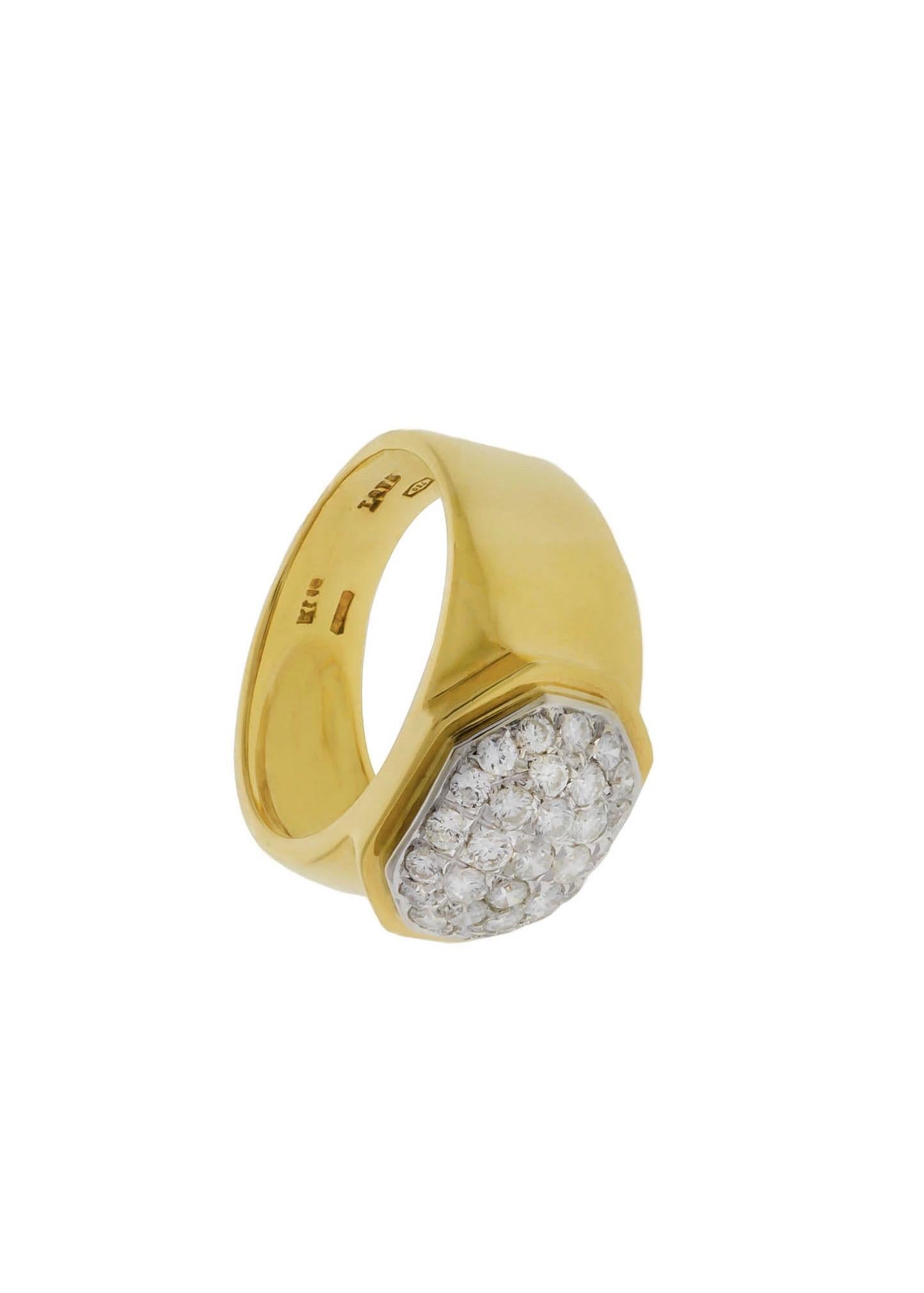 18K ring containing 0.71 carat in pave set round diamonds. The diamonds are set in a cluster hexagonal pattern surrounded by a bezel.
This ring also looks great as a pinky ring.
Size 6.5
Can be sized