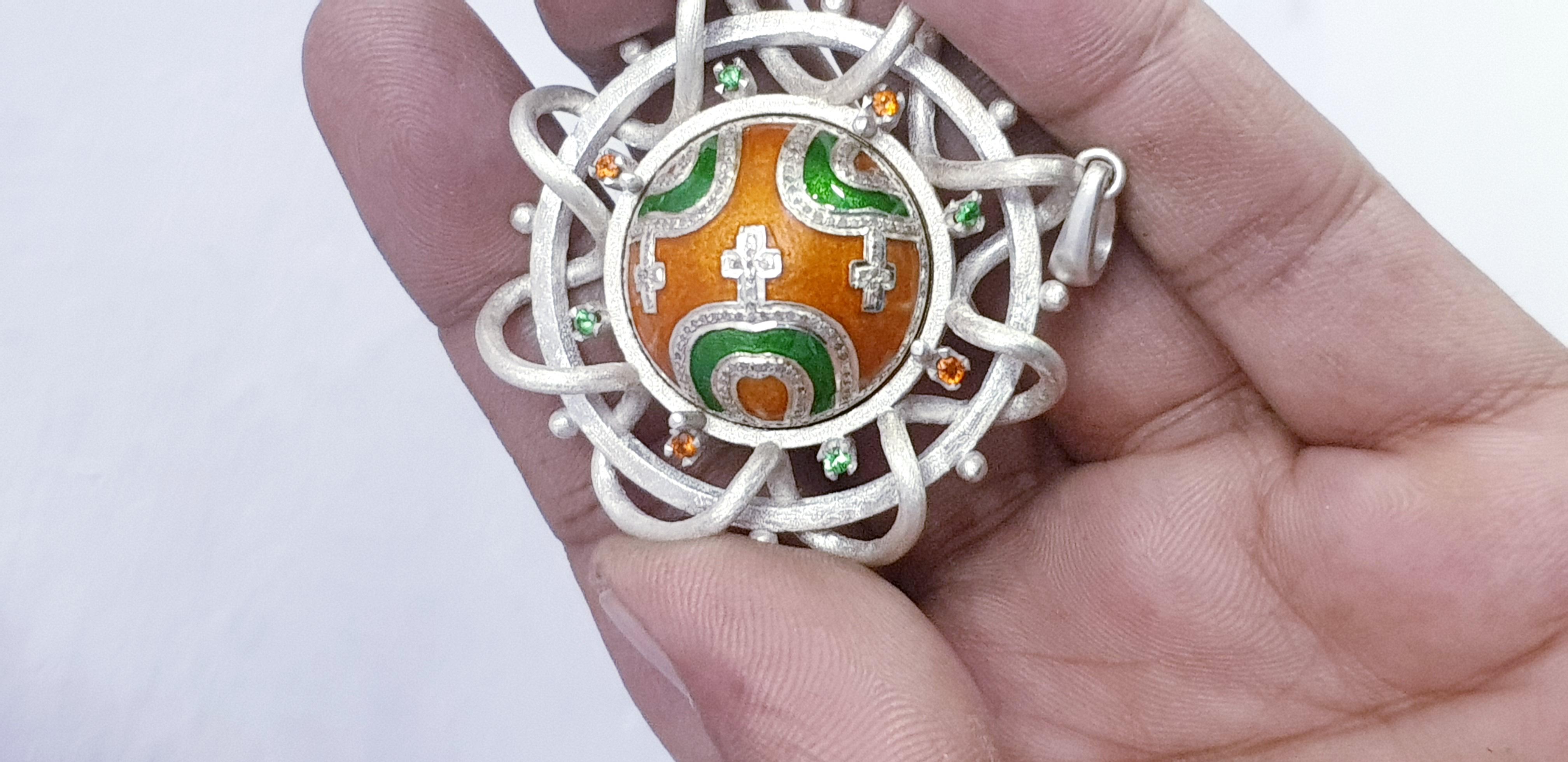 Pave diamond corss enamel pendant enamel necklace


Materials: 925 sterling silver 
Gemstone:
 Diamond  
Tsavorite garnet 
Mandrin garnet 
 
This item is a handmade silver pendant featuring orange and green enamel work and a surrounding cross