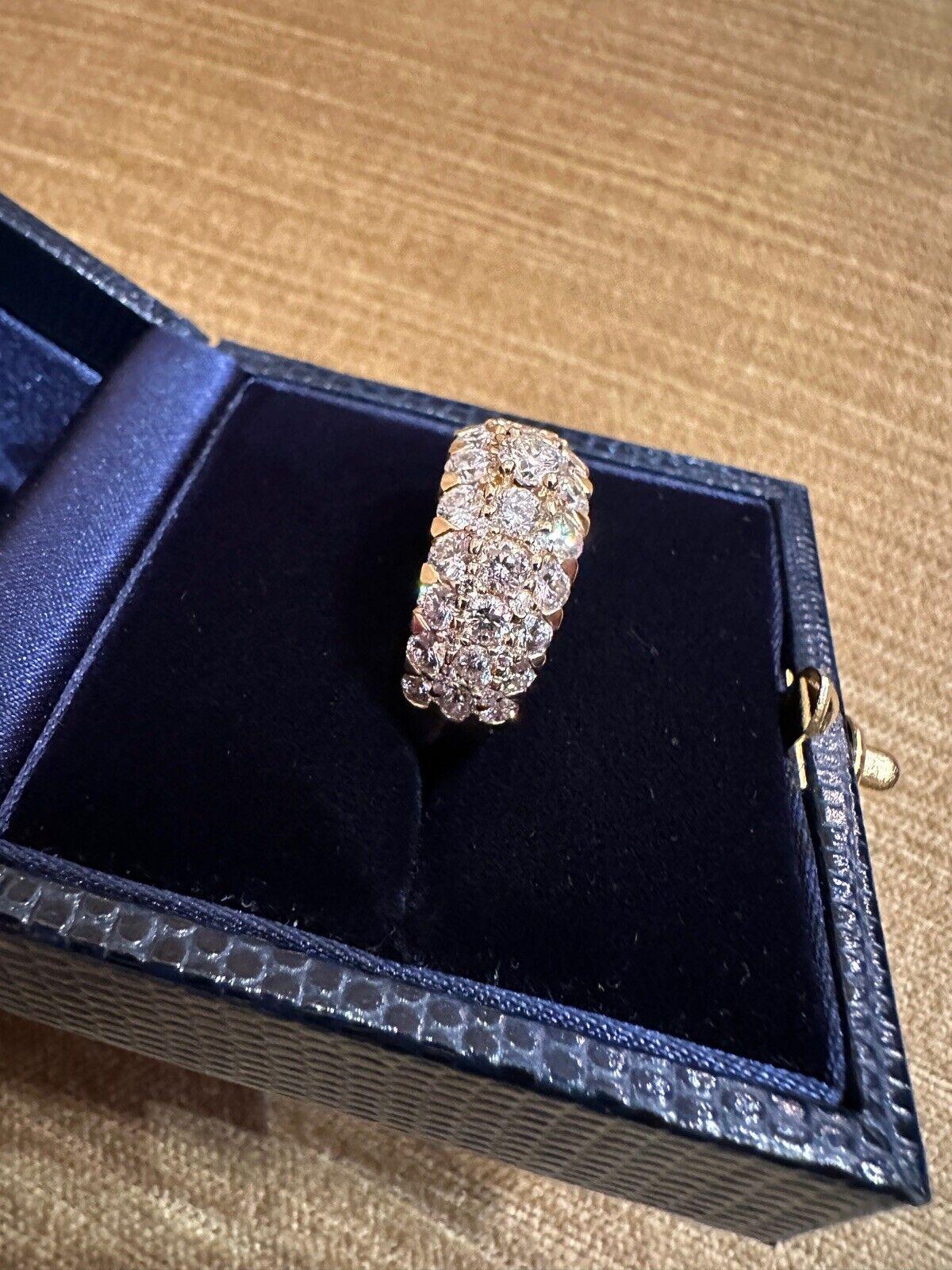 Pave Diamond Dome Ring 3.46 carat total weight in 18k Yellow Gold 

Diamond Dome Ring features Three Rows of Round Brilliant Diamonds with a larger center Diamond Pave set in 18k Yellow Gold.

The center diamond weighs .29 carats.
Total diamond