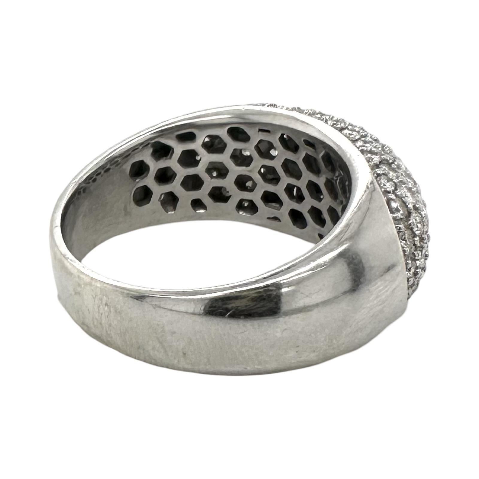 Material: White Gold

Metal Purity: 18k

Stones: Diamonds

Diamond Carat Weight: 0.65 Carat

Weight: 10.6 grams

Ring Size: 7, can be sized on request

Dimensions: 23.12 mm x 22.22mm

Includes: 2 yr warranty with Brilliance Jewels, Gift Box

can be