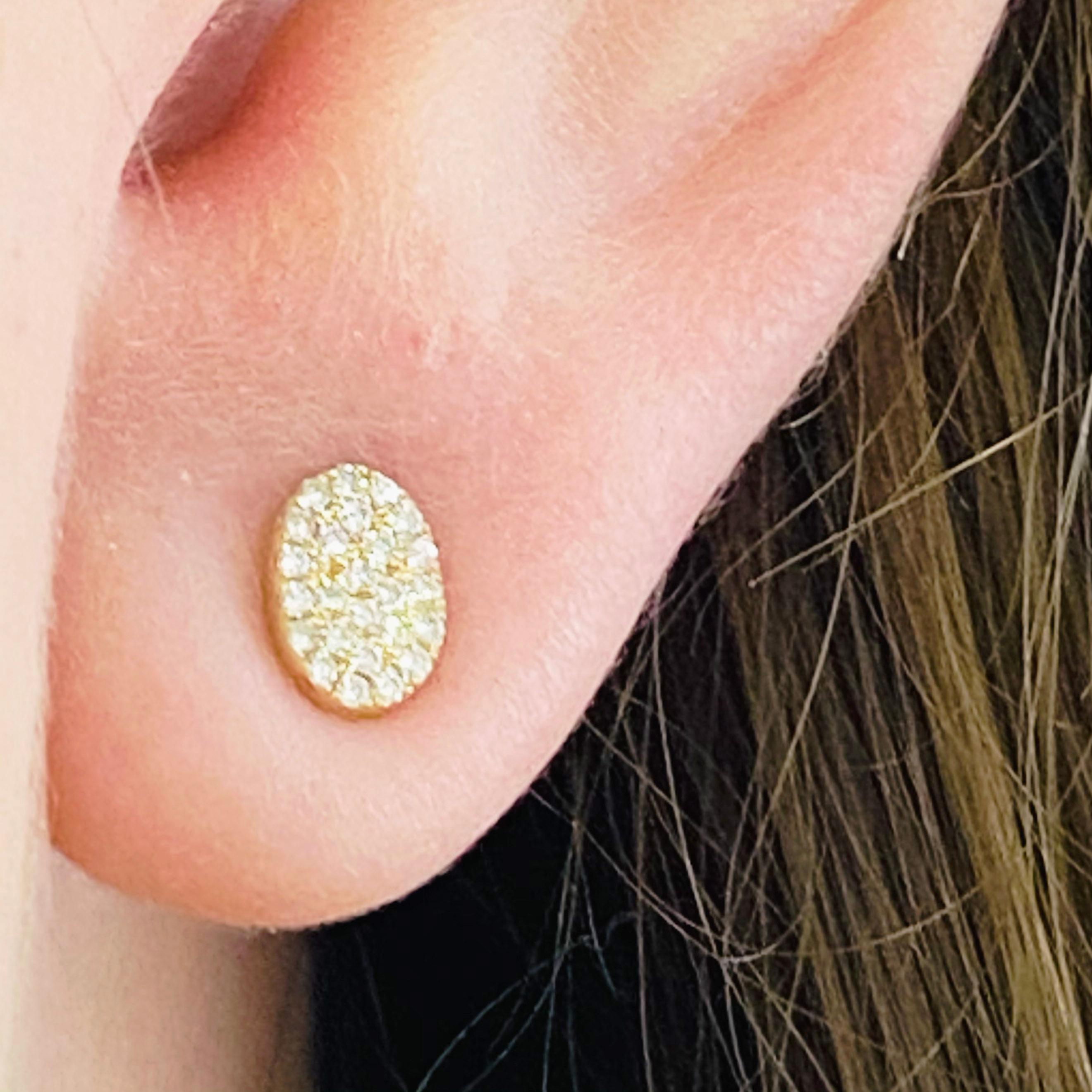 These stunning 14k yellow gold oval pave diamond stud earrings provide a look that is both trendy and classic. These diamond earrings are a great staple to add to your collection, and can be worn with both casual and formal wear.  These earrings