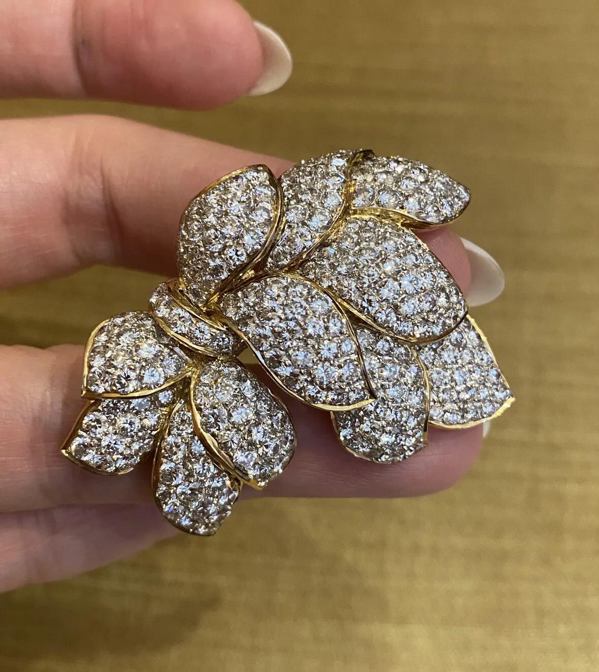 Pave Diamond Floral Spray Pin Brooch 10.86 carat total weight in 18k Yellow Gold

Diamond Flower Spray Brooch features overlapping petals of Pave set Round Brilliant Diamonds set in 18k Yellow Gold. Brooch is secured by a double bar clasp with