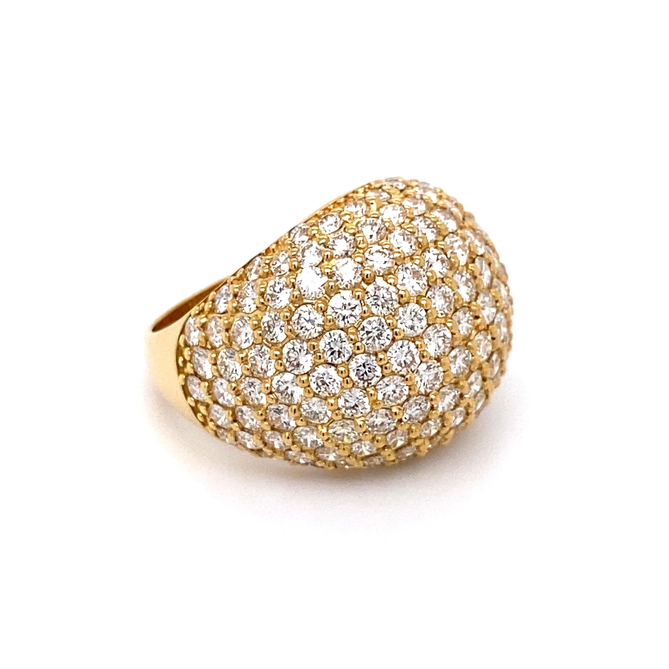 Simply Beautiful! Pave Diamond Dome Band Ring. Securely Hand set with VS/SI Diamonds, weighing approx. 5.07tcw. Hand crafted 18K Yellow Gold mounting. Measuring approx. 1.09” w x 0.91” w x 0.73” h. Ring size 7, we offer ring resizing. More Beautiful