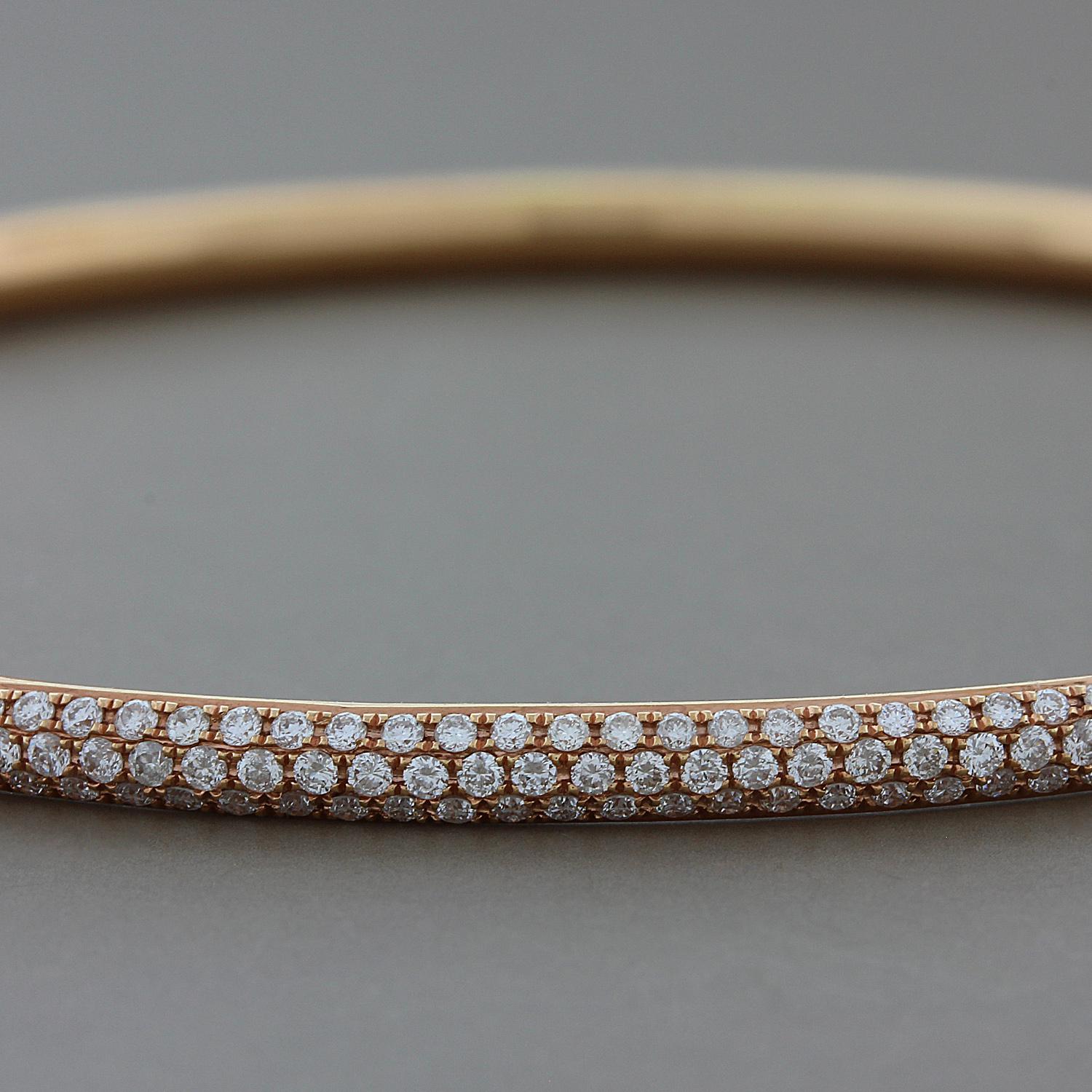 A striking eternity bangle featuring 3.12 carats of round cut, colorless VS quality, diamonds pave set in 18K rose gold.

Fits wrists up to 8 inches
