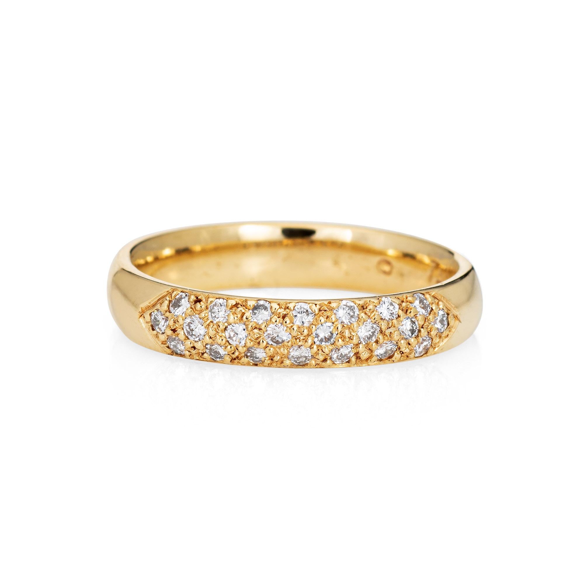 Stylish pave diamond half hoop band crafted in 18 karat yellow gold. 

Round brilliant cut diamonds total an estimated at 0.22 carats (estimated at H-I color and VS2-SI1 clarity). 

The band is pave set with diamonds in a half-hoop design. Great