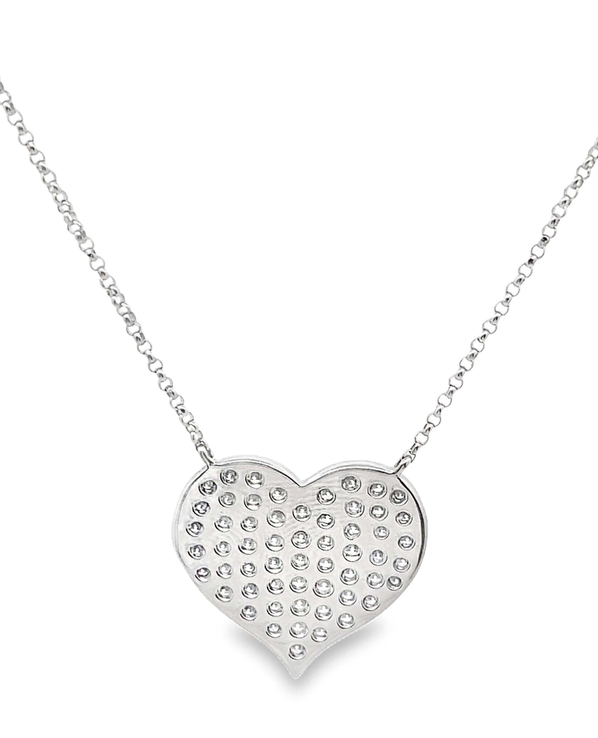 18K white gold pave heart necklace with round faceted diamonds weighing 1.18 carat total.

- Necklace is adjustable at 17 and 18 inches long
- Spring Clasp