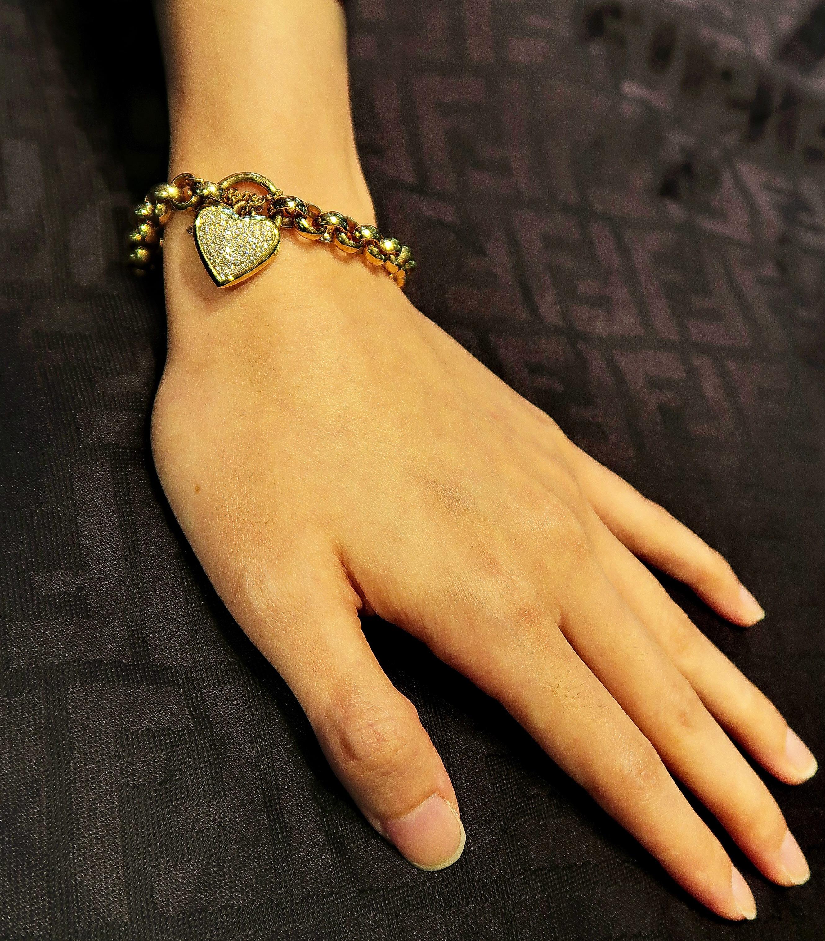 Pavé Diamond Heart Padlock Chain Yellow Gold Bracelet

Length: 7 inches

Gold: Yellow Gold 33.707 g
White Diamond: 0.55 ct