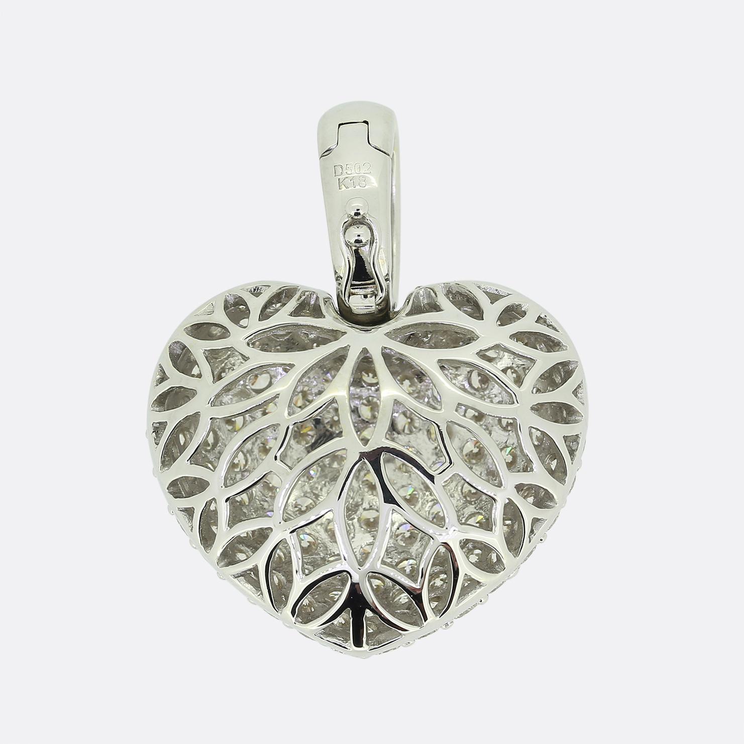 This is a wonderful contemporary diamond heart pendant. The heart has been pave set with 5.02 carats of round brilliant cut diamonds and crafted in 18ct white gold with an openwork back. 

Condition: Used (Excellent)
Weight: 13.6 grams
Pendant
