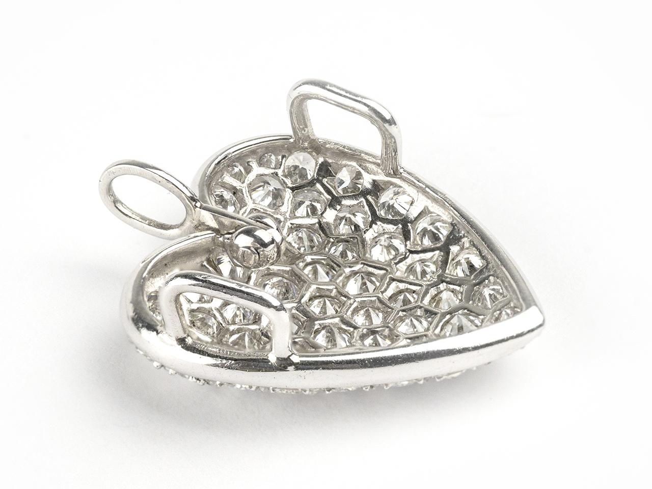 Platinum heart with pave diamonds. Diamond weight approximately 2.75 ct.