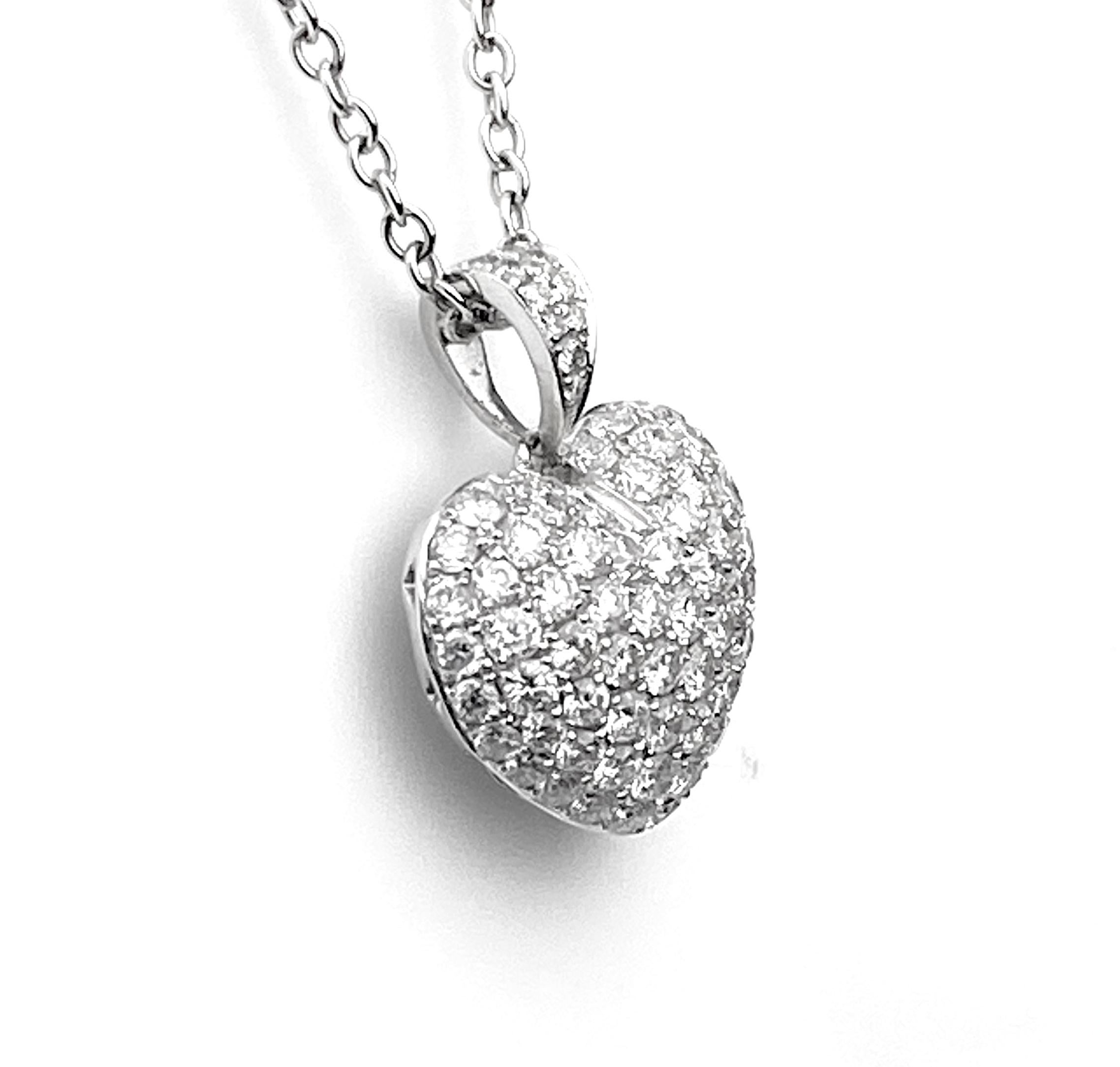 Ladies' pave' set white diamond heart in 18kt white gold, 1.31ct total diamonds F/G colour and VS/SI1 clarity. On 16