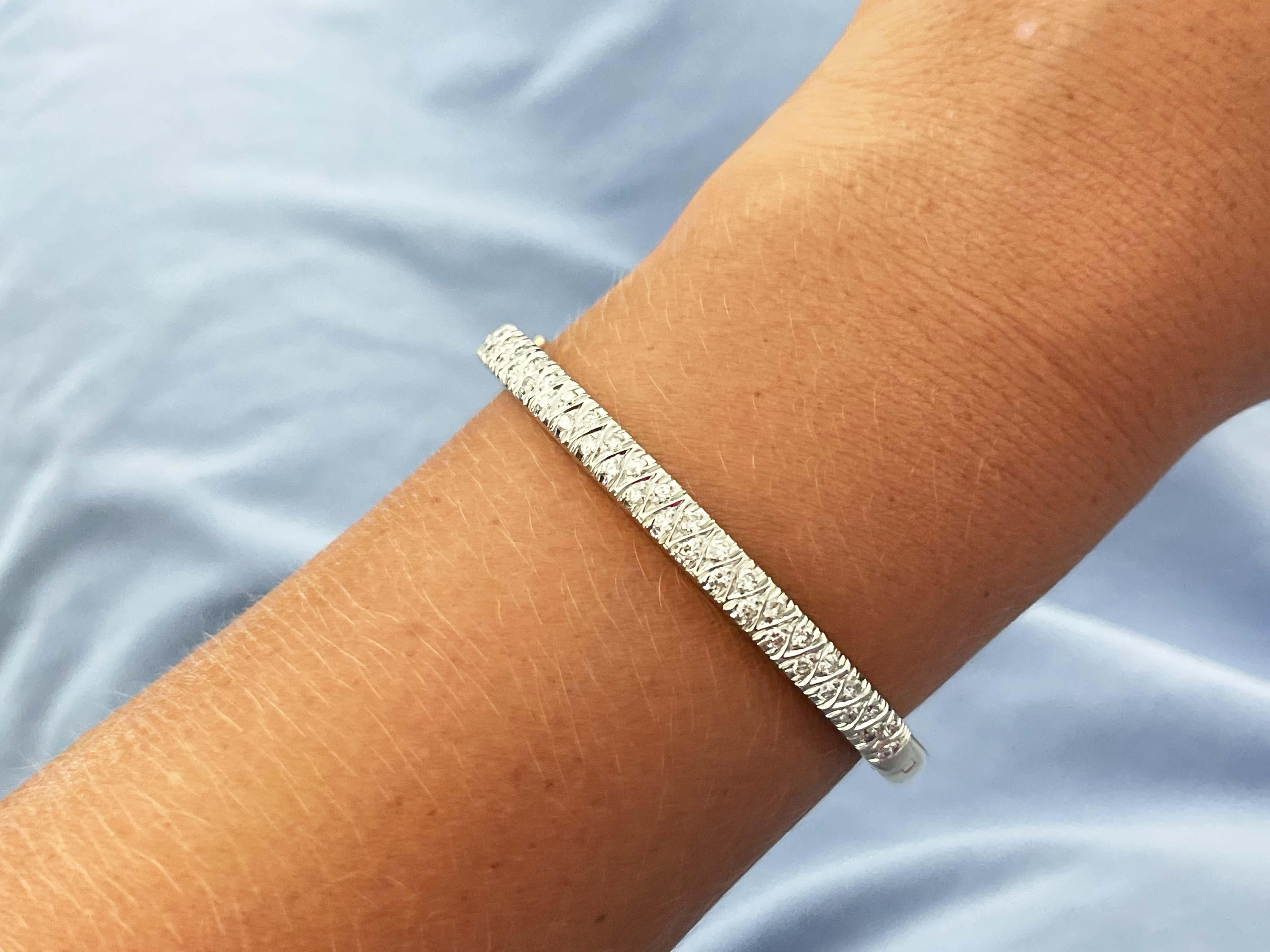Bracelet Specifications:

Metal: 14k Yellow Gold, diamonds are set around 14k white gold

Diamond Count: 44

Diamond Color: G-H

Diamond Clarity: SI

Diamond Carat Weight: 1.32

Inside Measurements: ~2.25