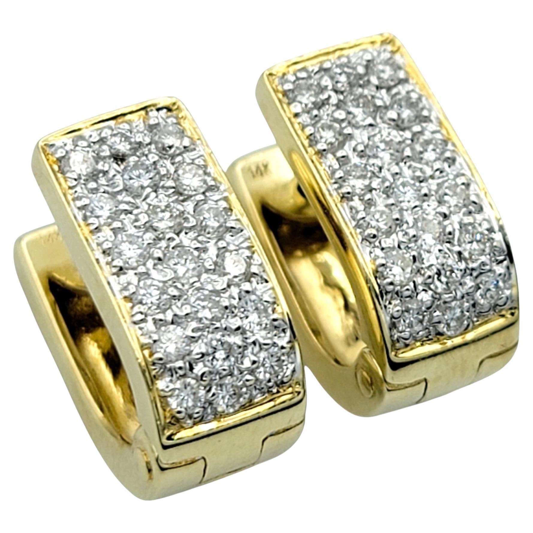 Pavé Diamond Huggie Hoop Earrings in Polished 14 Karat Yellow and White Gold