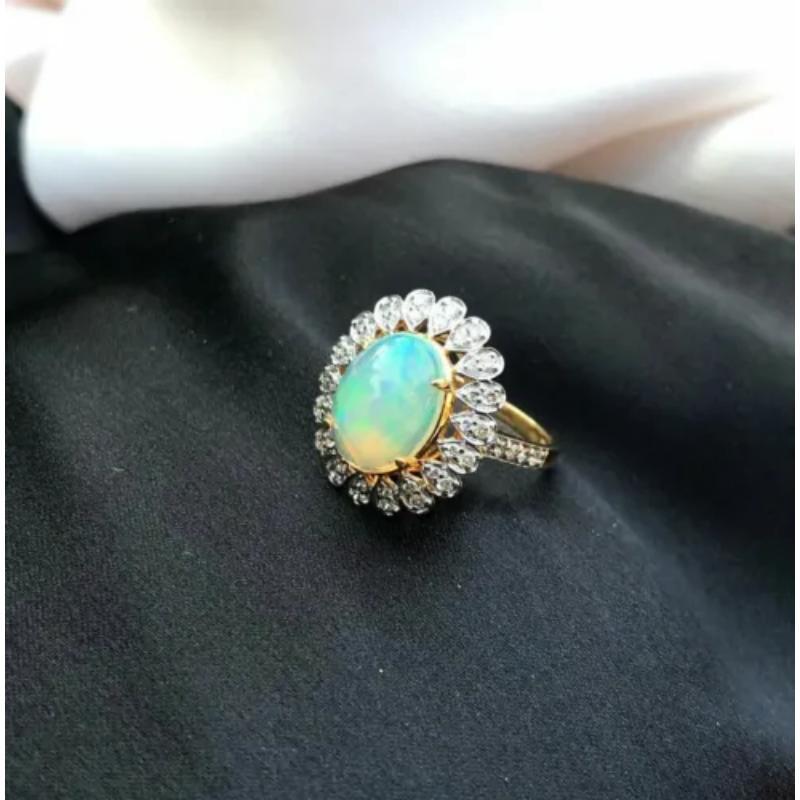 Oval Cut Pave Diamond Opal Ring in 14k Gold For Sale