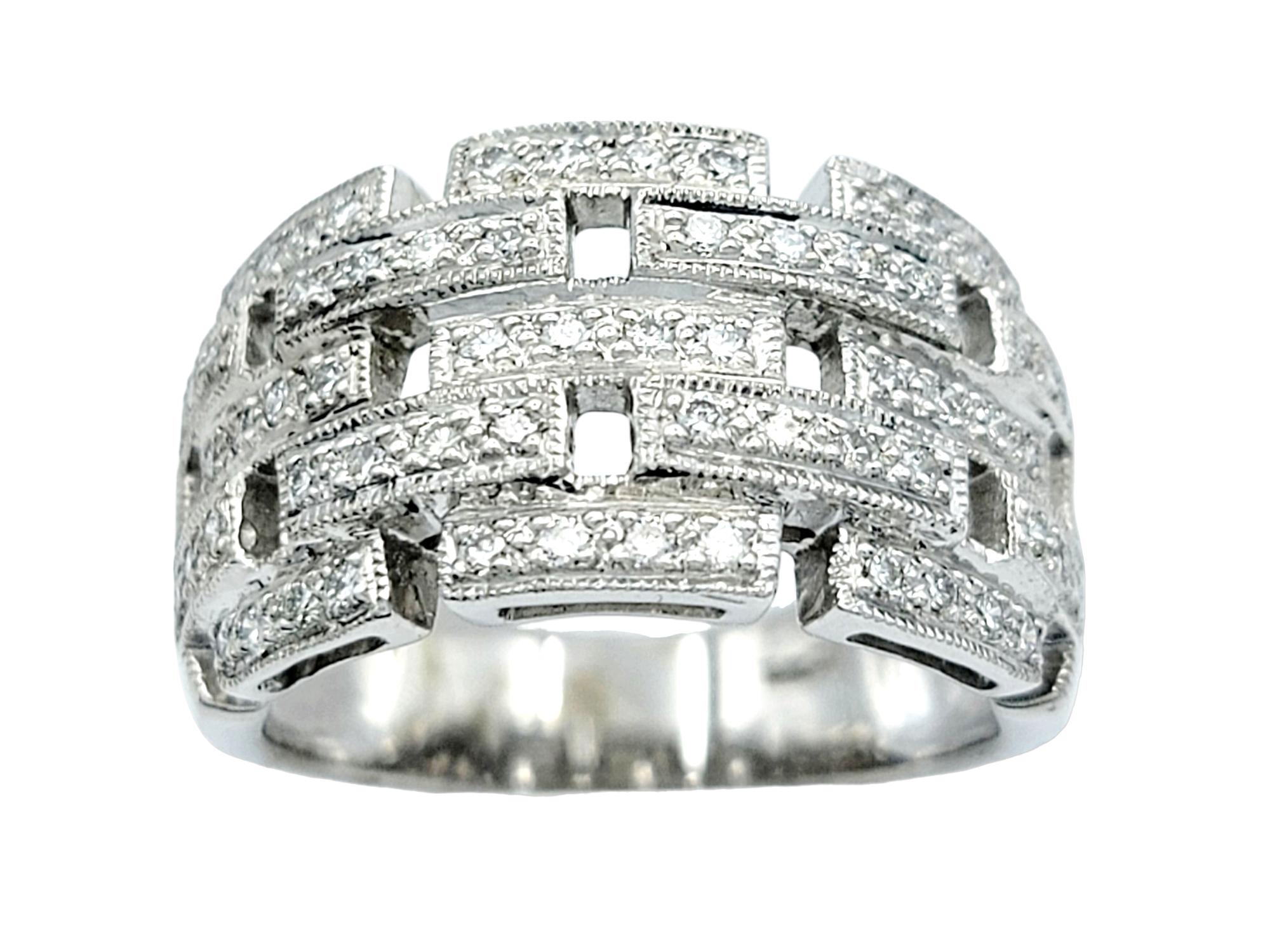 Ring Size: 6.5

Elegance meets contemporary design in this stunning diamond band ring, set in exquisite 18 karat white gold. The ring features a captivating panther link design, showcasing a pattern of sparkling stacked rectangles. The geometric