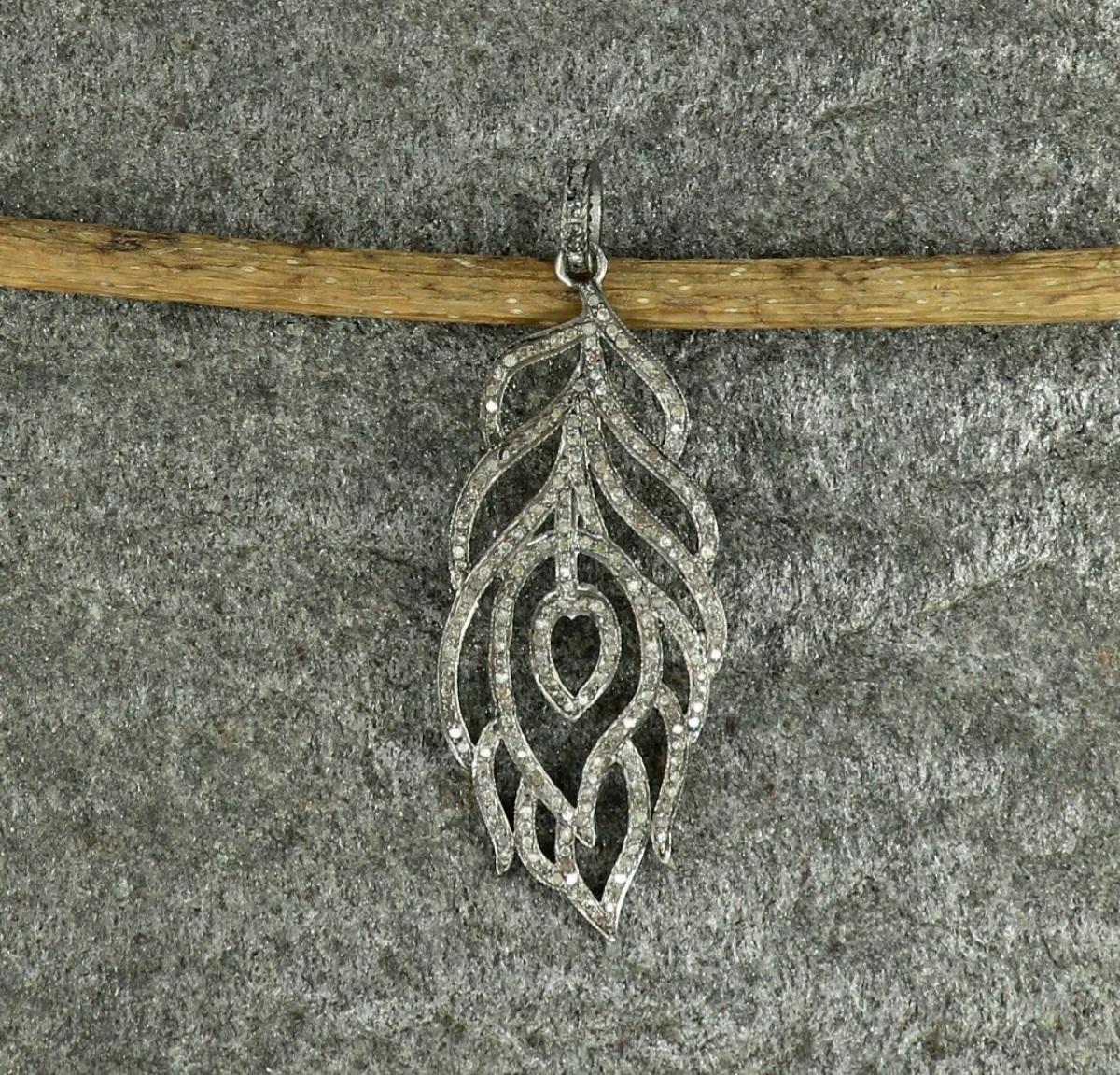 Pave Diamond Peacock Feather Pendant 925 Silver Diamond Necklace For Christmas.

Base Metal
Sterling Silver, 925 parts per 1000
Metal
Sterling Silver
Main Stone Shape
Round
Pendant Shape
Wing
Size
23x64mm
Metal Purity
925 parts per 1000






A P P