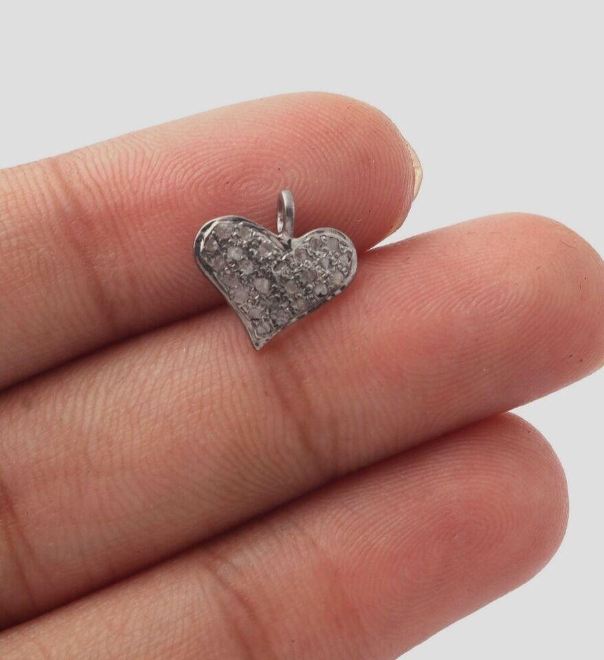Pave diamond pendant 925 sterling silver heart shape pendant diamond pendants.

Size
11mmx12mm approx

Theme
Love & Hearts

Featured Refinements
Silver Charm

Type
Pendant charm 

Size
11mmx12mm approx


Handmade
Yes

Country/Region of