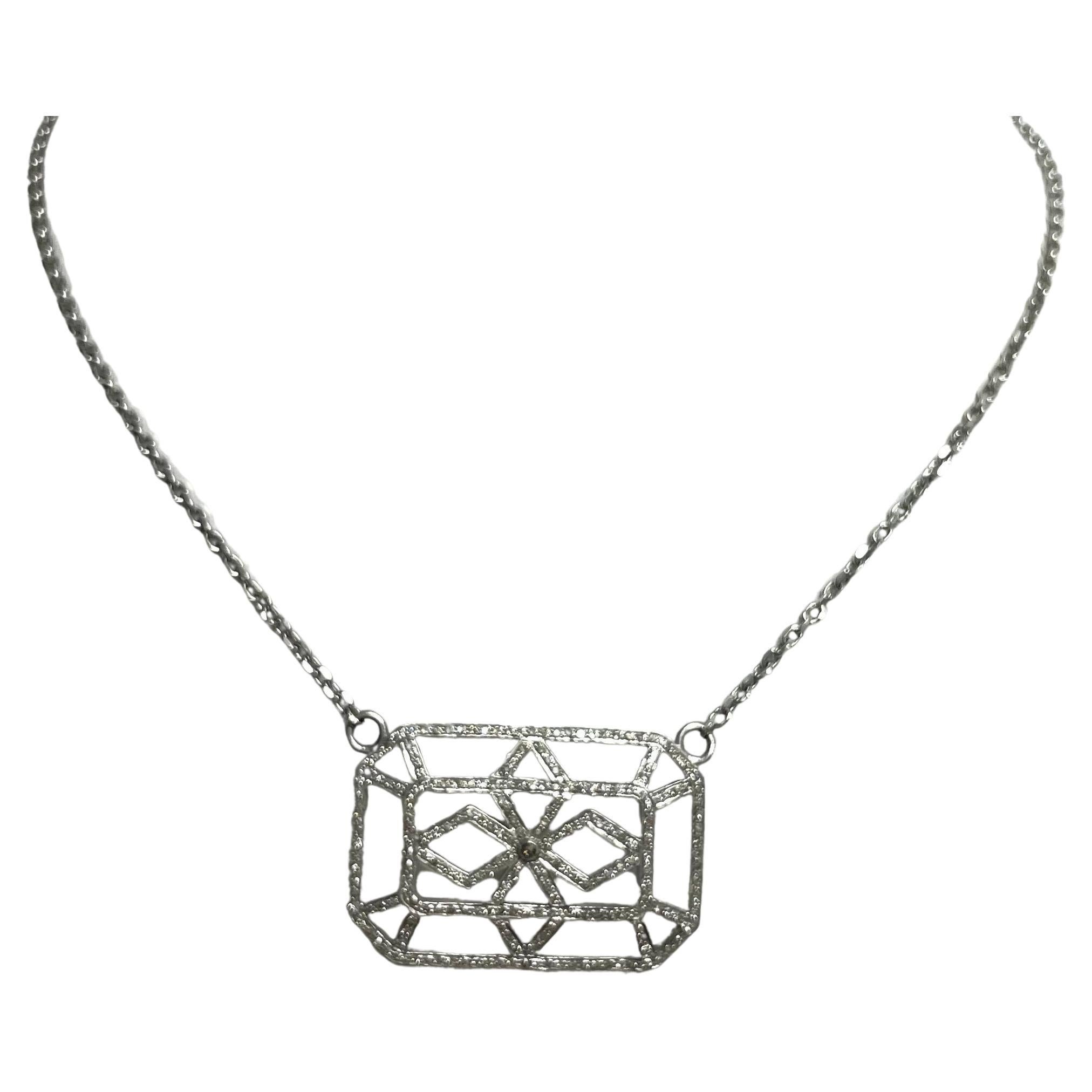 Description
Fashionable large pave diamond rectangular pendant on a diamond cut 14k white gold chain.
Item # N3727

Materials and Weight
Pave diamonds 2cts, 24 x 34mm, rectangle shape
Rhodium sterling silver
14k white gold chain

Dimensions
Length