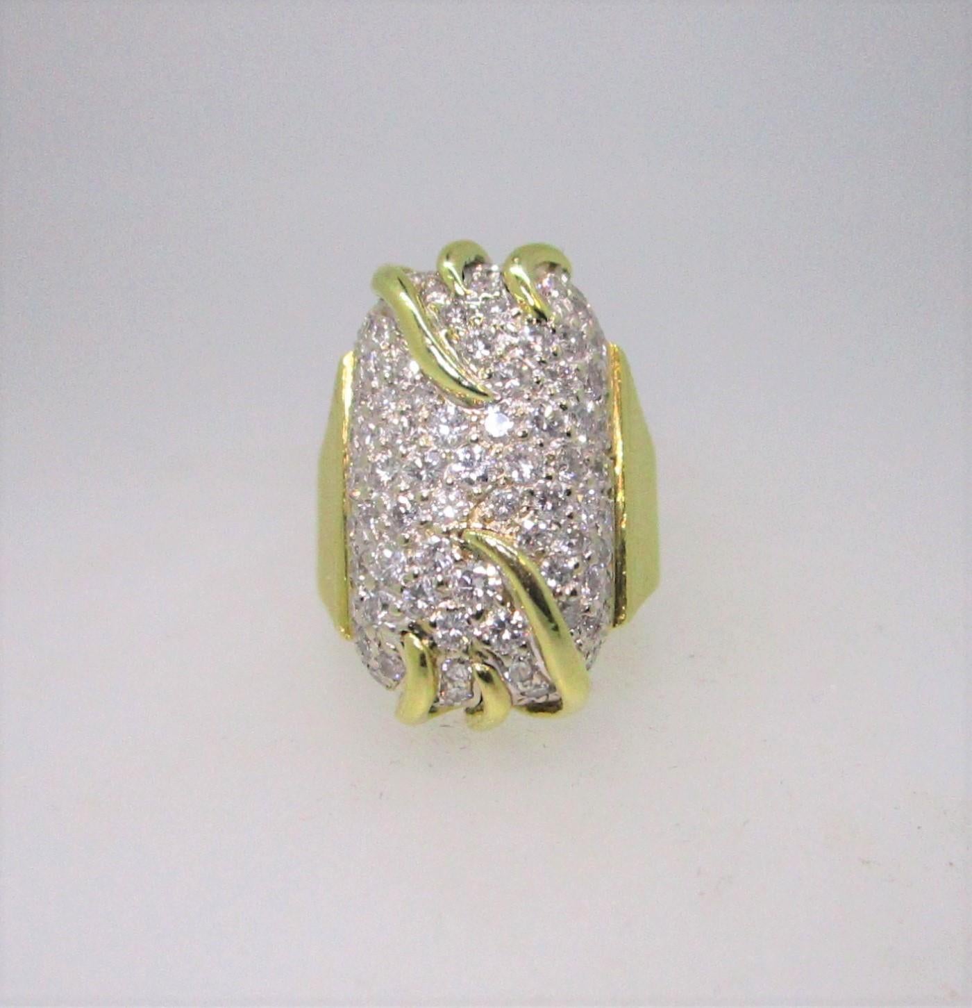 Fabulous Retro look with pave diamonds set in 18 Karat yellow gold. This piece is definitely a show stopper!  Size 5.5
