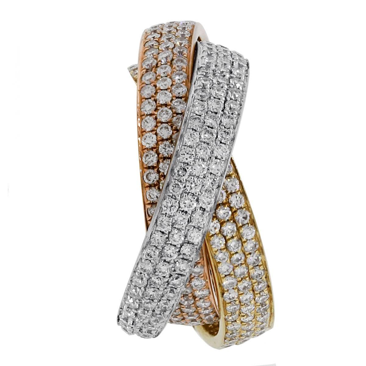 Material: 18k white gold, 18k yellow gold and 18k rose gold
Diamond Details: Approximately 3.01ctw round brilliant pave set diamonds. Diamonds are G/H in color and SI in clarity.
Ring Size: 6
Ring Measurements: 1″ x 0.45″ x 1″
Total Weight: 8.8g
