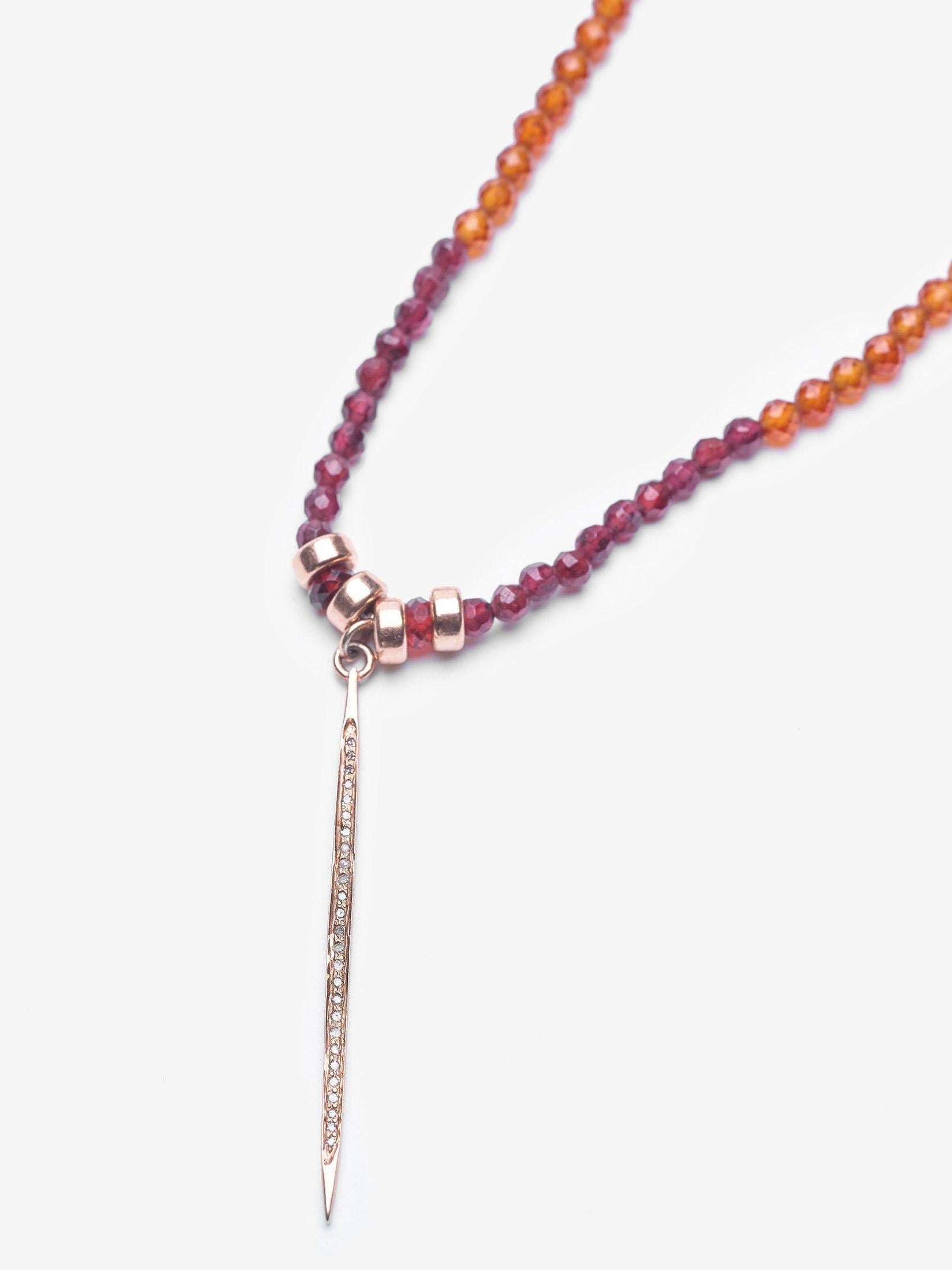 A garnet and pavé diamond necklace is a must-have in your jewelry collection. The warm autumn stones are accented with rose gold.  The variations of garnet and citrine are incredible purifiers for the body.  The necklace is accented with with a pave