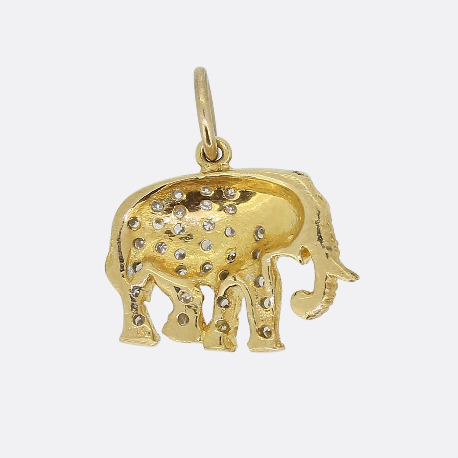 Here we have a vintage 18ct yellow gold pendant crafted into the shape of an elephant. All iconic features have been expertly demonstrated including large ears, trunk and tusks whilst the body has been pave set with 32 round brilliant cut diamonds. 