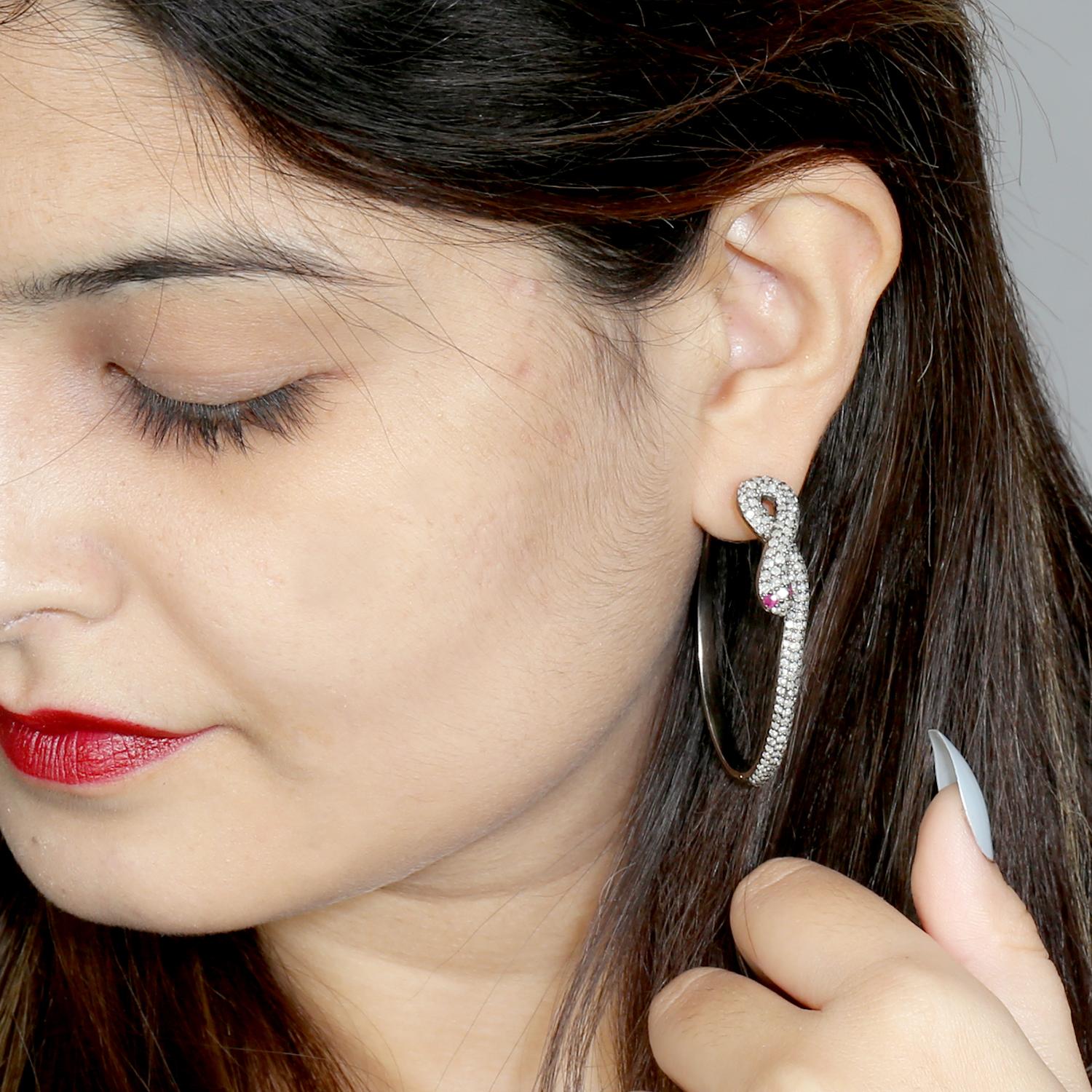 18KT:0.400g,D:3.44ct,SI:14.140g, Rubino:0.23ct, 54X39 MM