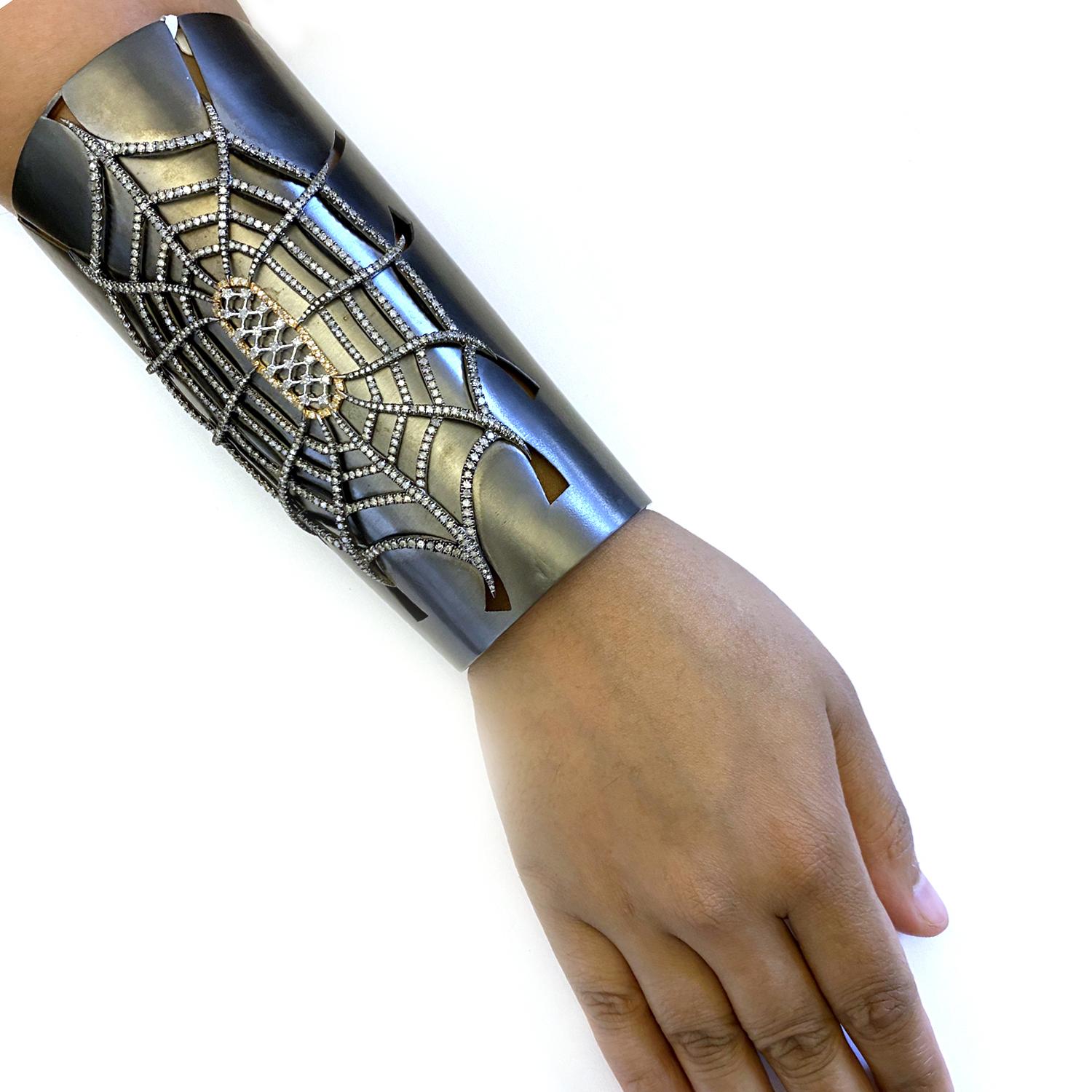 Diamond Spider Cuff Side Openable 5.5 inch long tapers down from your wrist to mid arm. 

Diamond:9.15 cts.