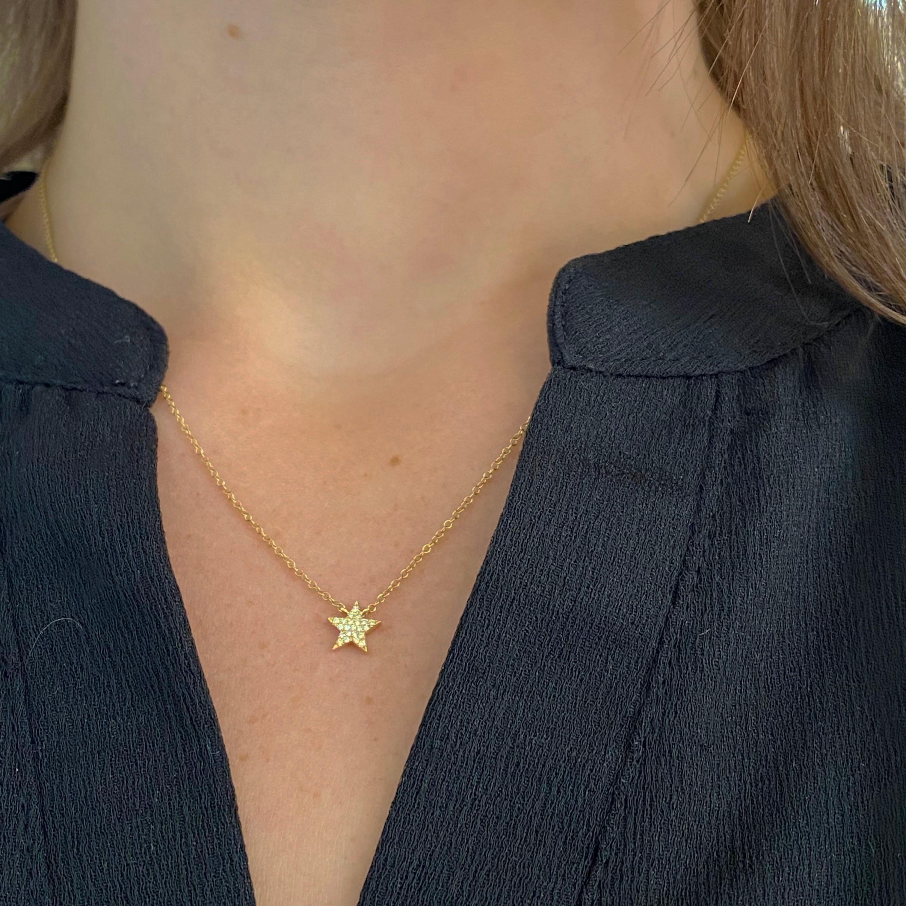 The details for this beautiful necklace are listed below:
Metal Quality: 14 kt Yellow Gold 
Pendant Style: Attached 
Diamond Number: 23
Diamond Shape: Round Brilliant 
Diamond Total Weight: .05 ct 
Diamond Clarity: VS2 (Excellent, Eye Clean)
Diamond