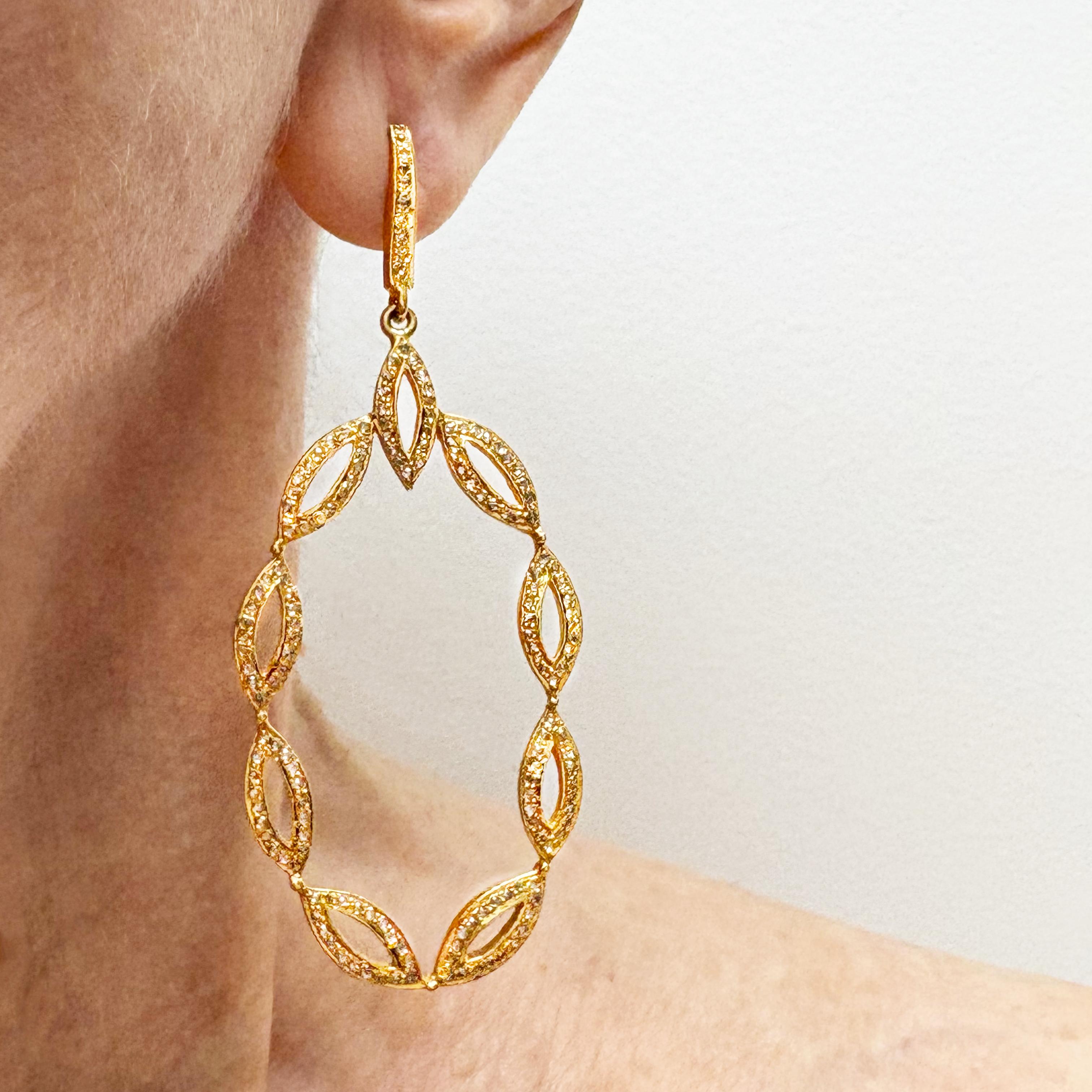 Description 
A delicate composition of individually crafted vermeil pavé diamond links forms an airy, open design, gracefully suspended from 14k gold pavé diamond posts. Lightweight yet luminous, these earrings offer refined sparkle with effortless