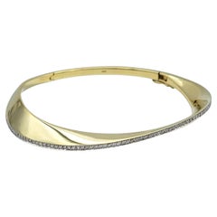 Pavé Diamond Wave Design Hinged Bangle Bracelet in 14 Karat Yellow Gold
