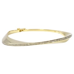 Contemporary Pavé Diamond Wavy Hinged Bangle Bracelet in 14 Karat Yellow Gold