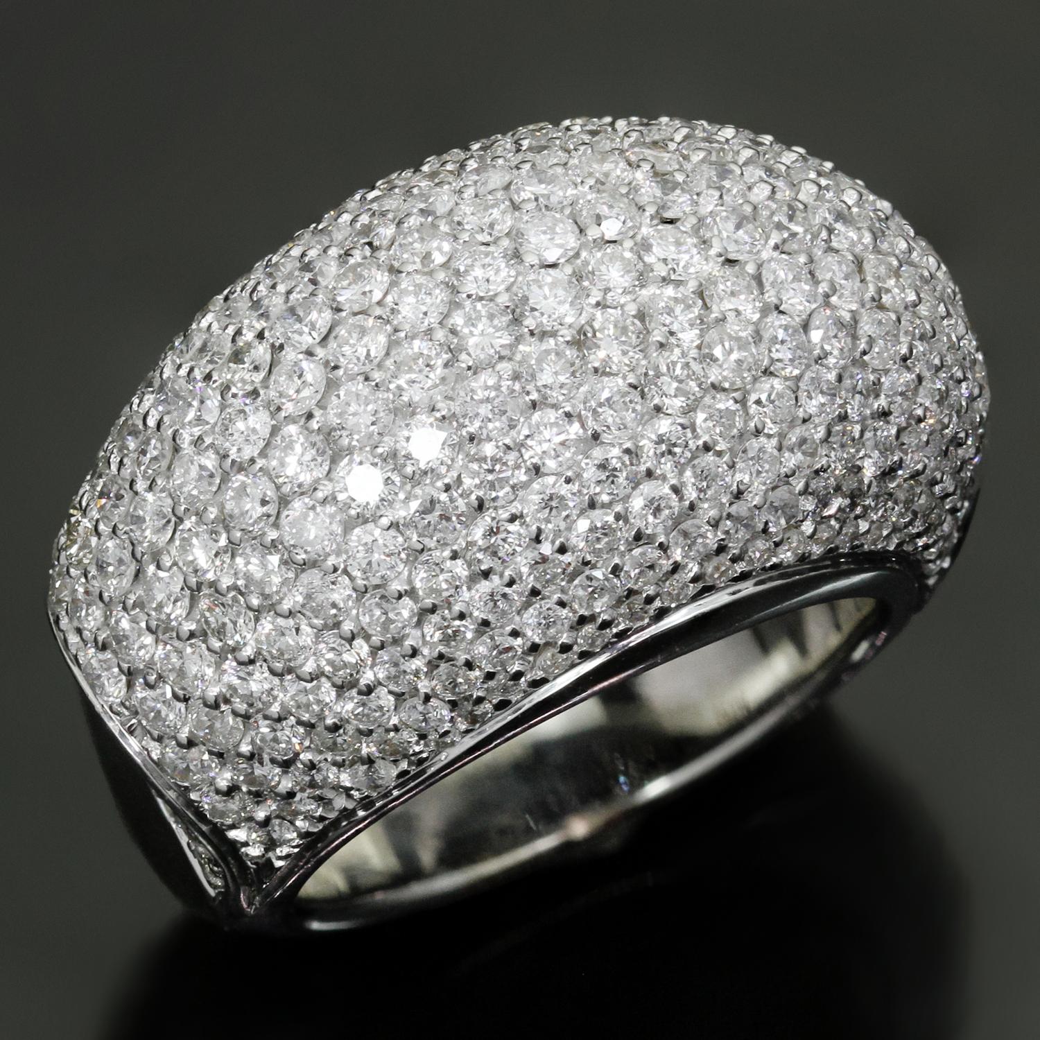 This chic and fabulous domed ring is crafted in 18k white gold and set with round brilliant F-G VVS2-VS1 diamonds weighing an estimated 3.40 carats. Made in United States circa 2010. Measurements: 0.59