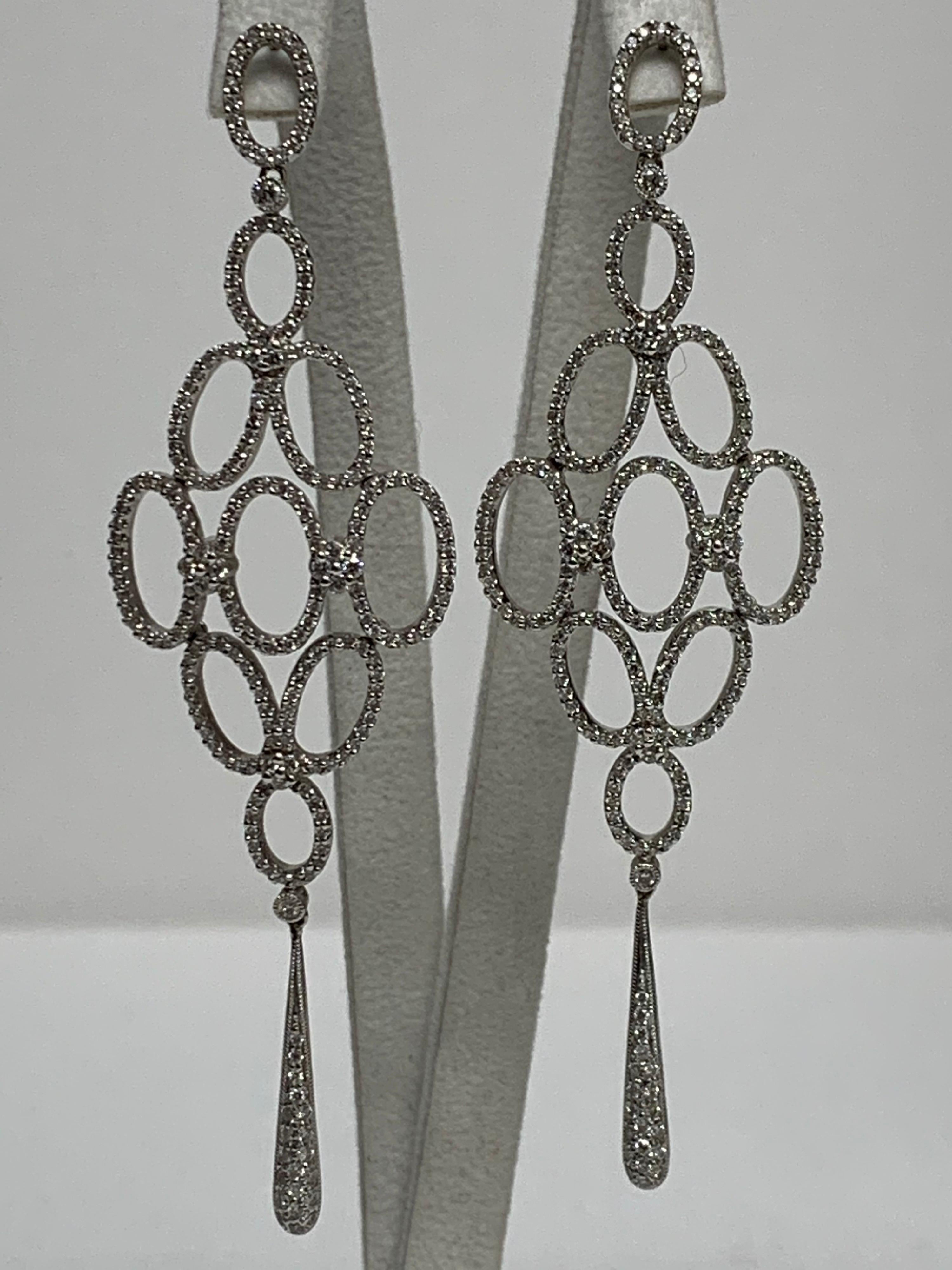 Pavé Diamond, White Gold Earrings, Art Nouveau

Featuring an exquisite pair of White Pavé Diamond Earrings with a total weight of 2.36 carats, set in 18K White Gold.

This one-of-a-kind pair of earrings was created by hand and in CAD, Computer Aided