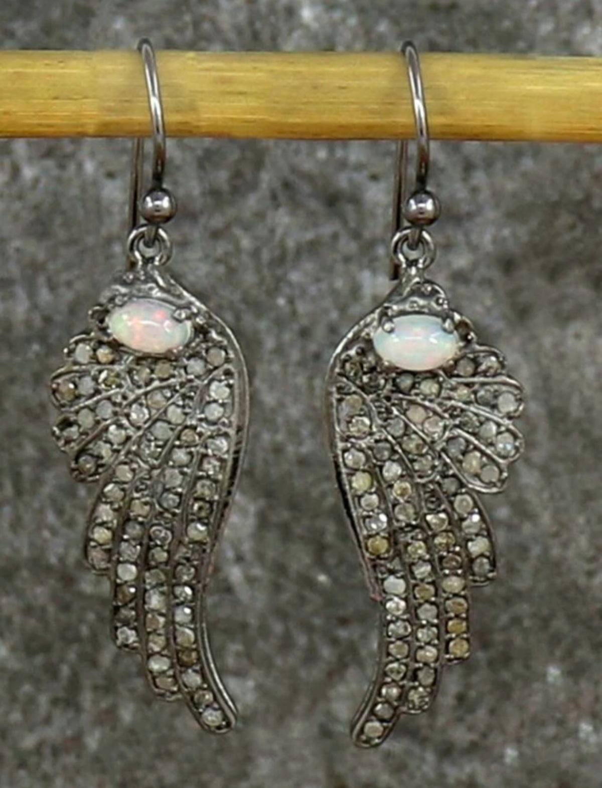Pave Diamond Wing Earring 925 Silver Opal Stone Wedding Earring Dainty Charm.

Base Metal
Sterling Silver, 925 parts per 1000
Diamond Weight
1.22 Cts Approx
Metal
Sterling Silver
Main Stone Shape
Round
Size
13x45mm Approx
Opal Weight
1.10 cts