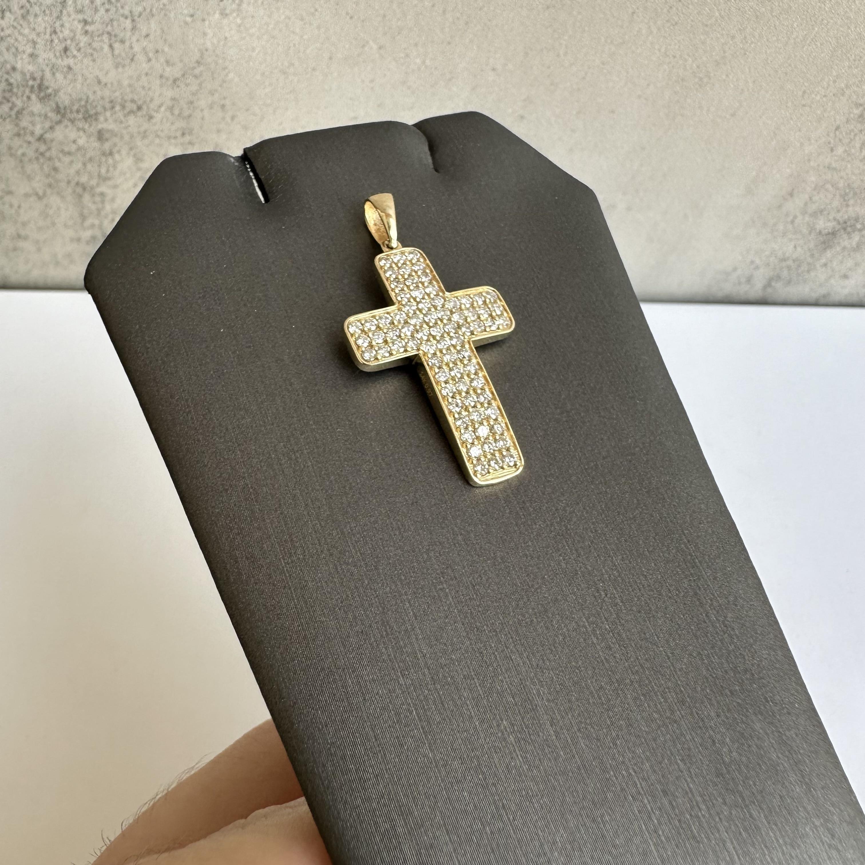 Enhance your collection with this stunning Pavé Natural Diamond Cross Pendant in 14kt Yellow Gold. Featuring 0.97ctw of natural GH color, SI2-I1 clarity round diamonds, this exquisite pendant sparkles with every movement and adds a touch of elegance