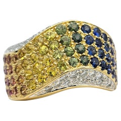 Bague ondulée en or jaune 18 carats, pavée de saphirs arc-en-ciel et de diamants