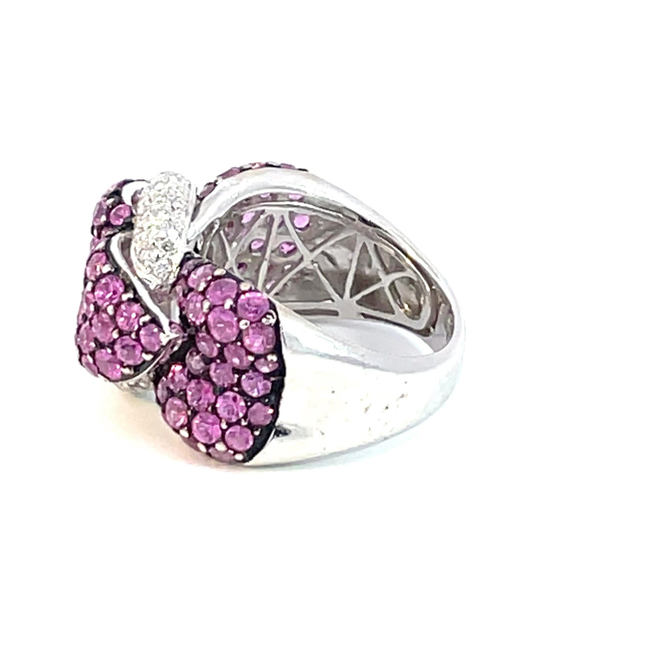 Round Cut Pavé Ribbon Ring with Pink Sapphires & White Diamonds in 18 Karat White Gold For Sale