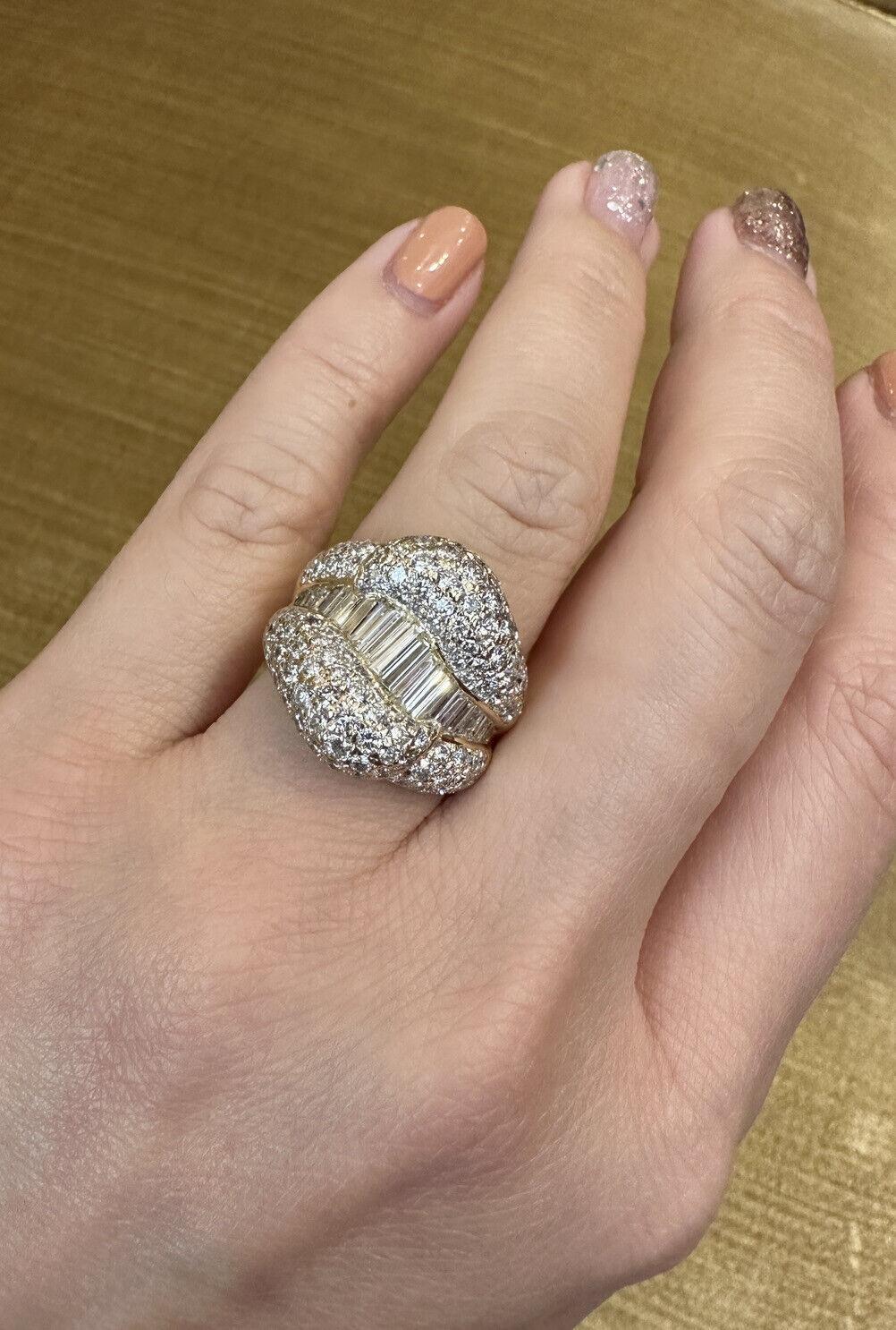 Pavé Round and Baguette Diamond Band Ring 3.45 carat total weight in Platinum and 18k Yellow Gold

Diamond Band Ring features Round Brilliant Diamonds pavé-set in two sections, with Baguette Diamonds channel-set in the center, all set in a Platinum