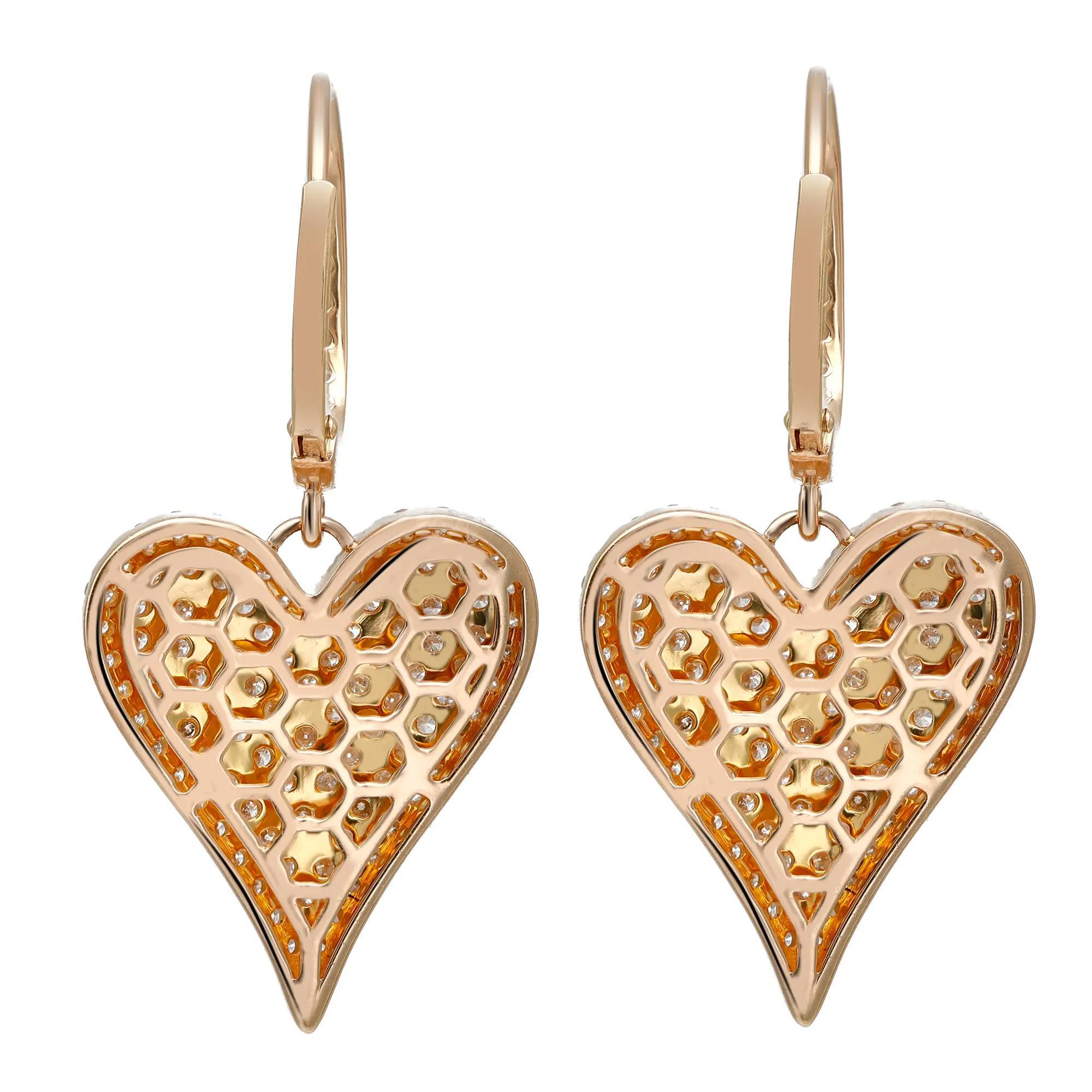 Fun and exquisite 14K yellow gold lightweight diamond drop earrings featuring pave set round brilliant cut diamonds set in a heart shape drop shank that dangle from a diamond studded hinged post. Total diamond weight: 2.00 carats. Diamond quality: