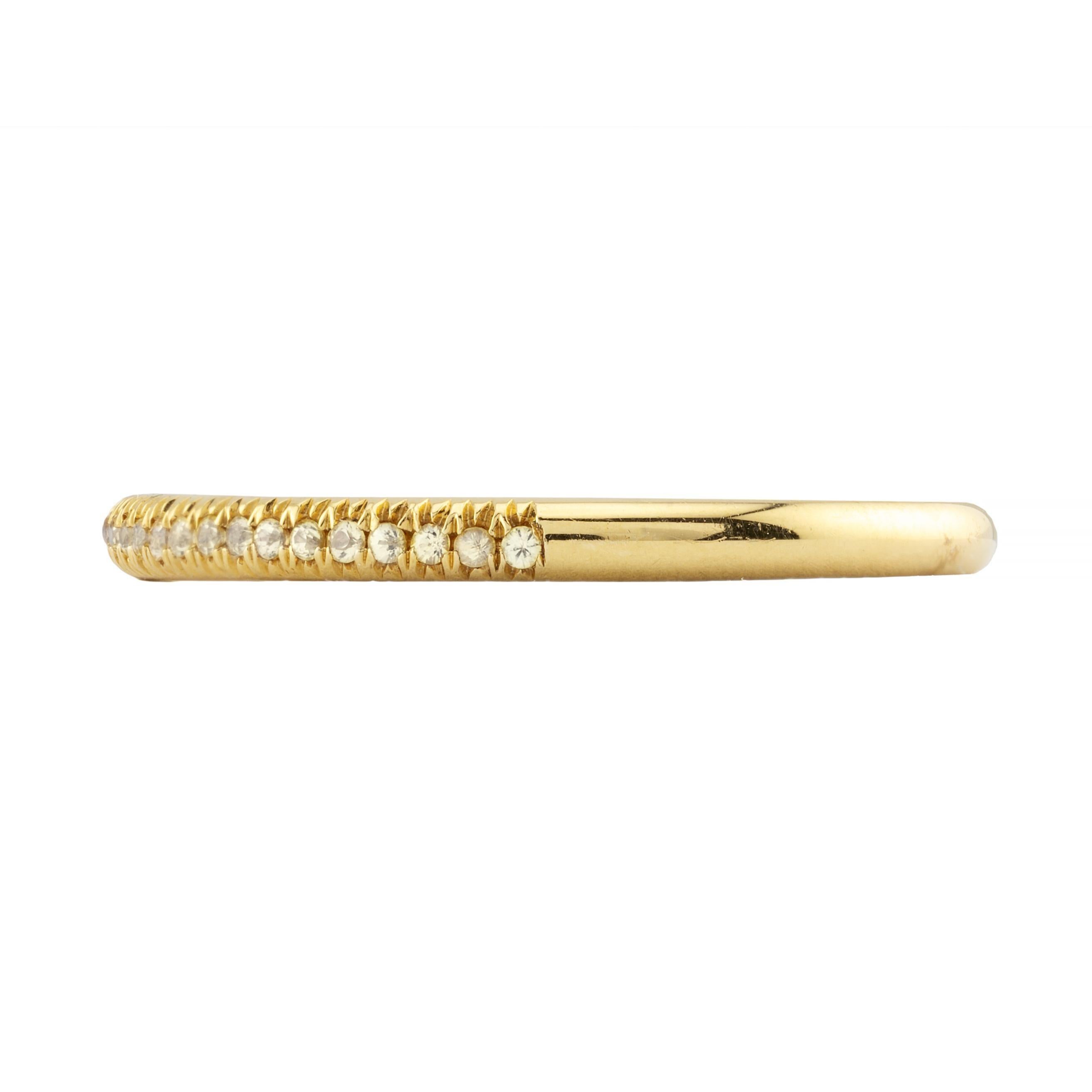 Aston Estate Jewelry Presents:

A vibrant pave set diamond band ring in rich 18 karat yellow gold. Set with 27 brilliant cut natural fancy yellow diamonds of a combined 0.27ct with VS to SI clarity.

Hallmarked as 18 karat gold.

Ring measures 2mm