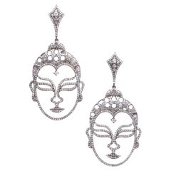 Orecchini Buddha con diamanti incastonati a Pave