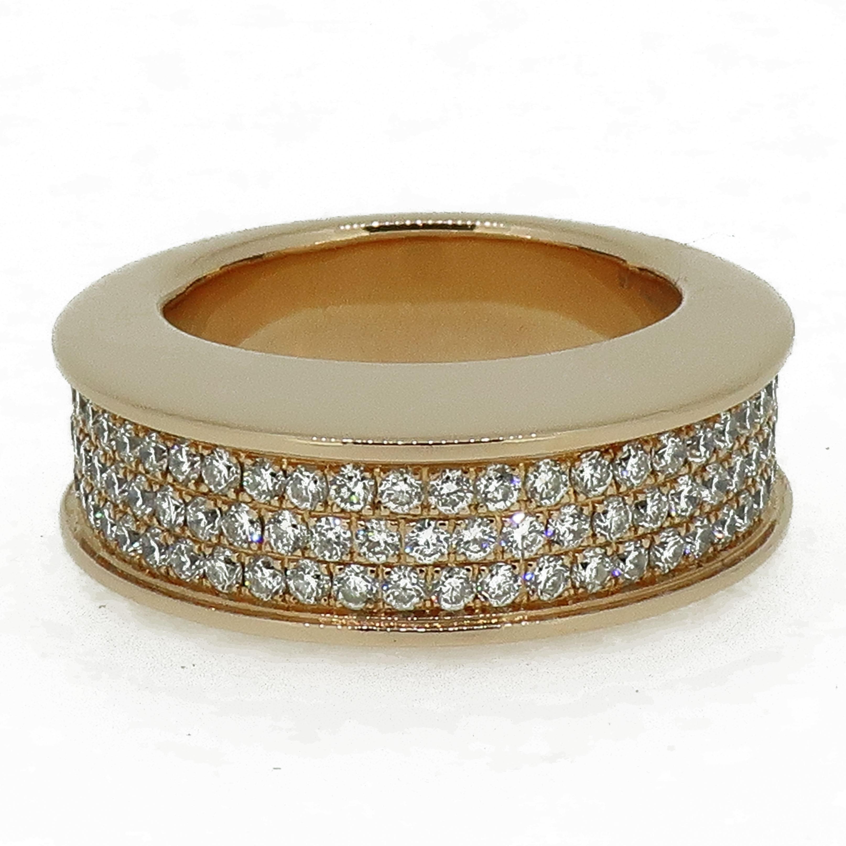 Pave Set Diamond Domed Ring 18 Karat Rose Gold 1.45 Carat

A stand out ring that features three rows of sparkling round brilliant diamonds in a micro-pave setting in a domed design, width of this impressive ring is 7.3mm. Solid gold and smoothed fit