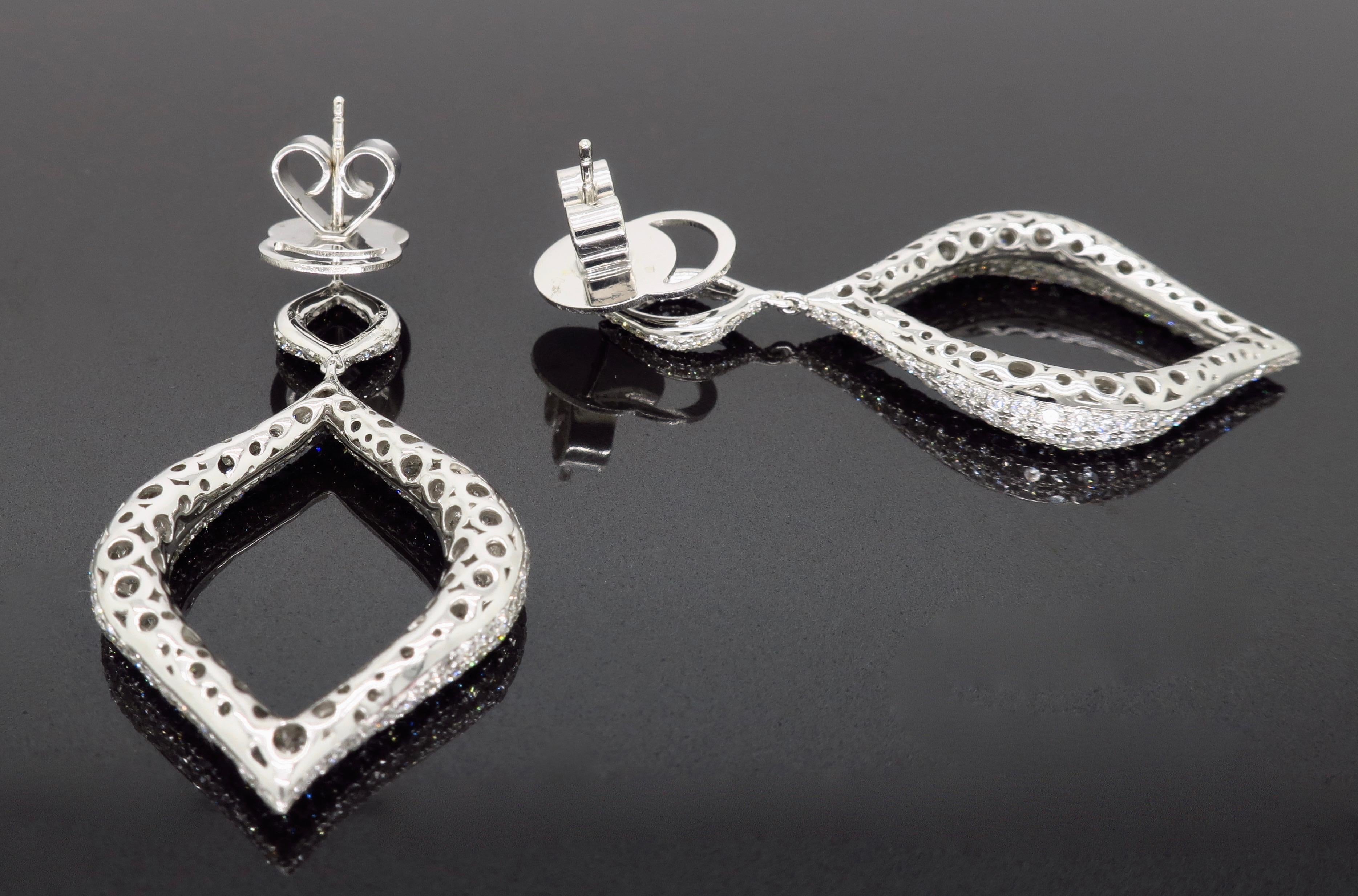 Round Cut Pavé Set Diamond Drop Earrings in 18 Karat White Gold