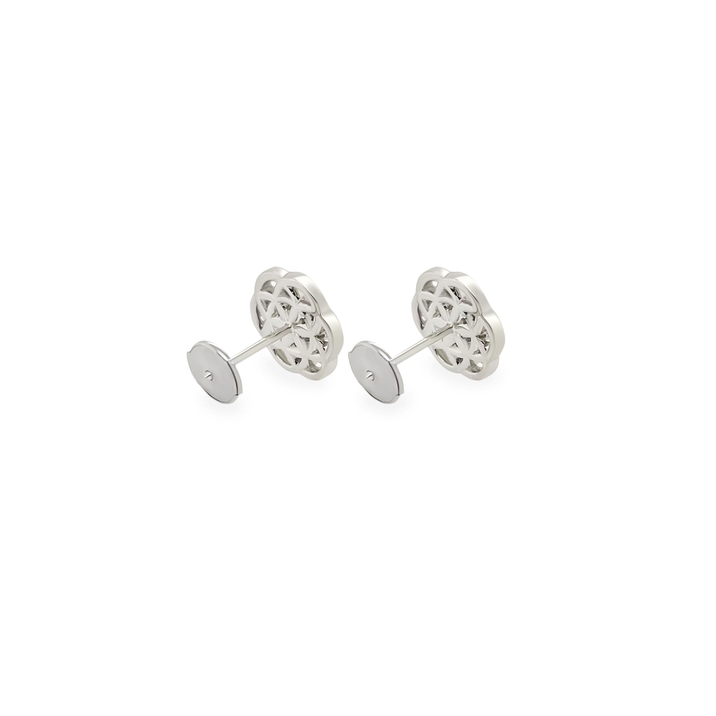 Our Flower of Life Earrings are expertly crafted from shimmering 18k white gold and high quality diamonds. This intricate design captures the essence of interconnectedness and is a symbol of harmony for all living things with micro pave'd diamonds.