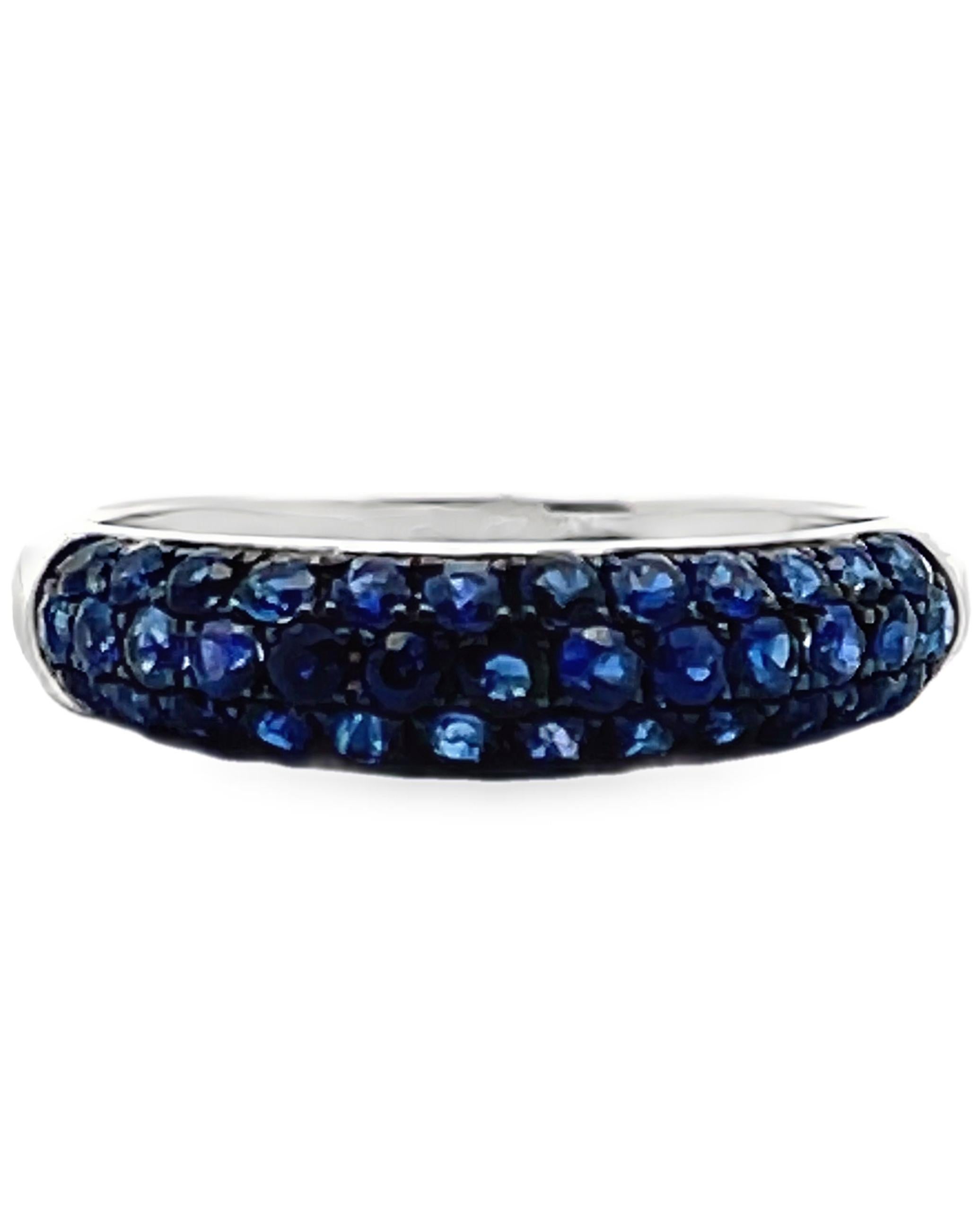 18K white gold pave set ring with round faceted sapphires weighing 1.00 carats total.