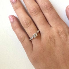 Pave Twist Solitaire Engagement Ring with Forevermark Diamond