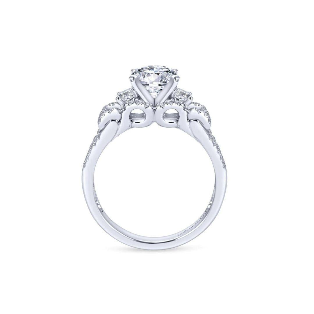 Ladies' Raised Shoulders 14k White Gold Diamond Engagement Mounting. Mounting features a split shank that raises up in elegant domed shoulders, emphasizing the center stone with an antique flair. Center diamond NOT included. Total carat weight of